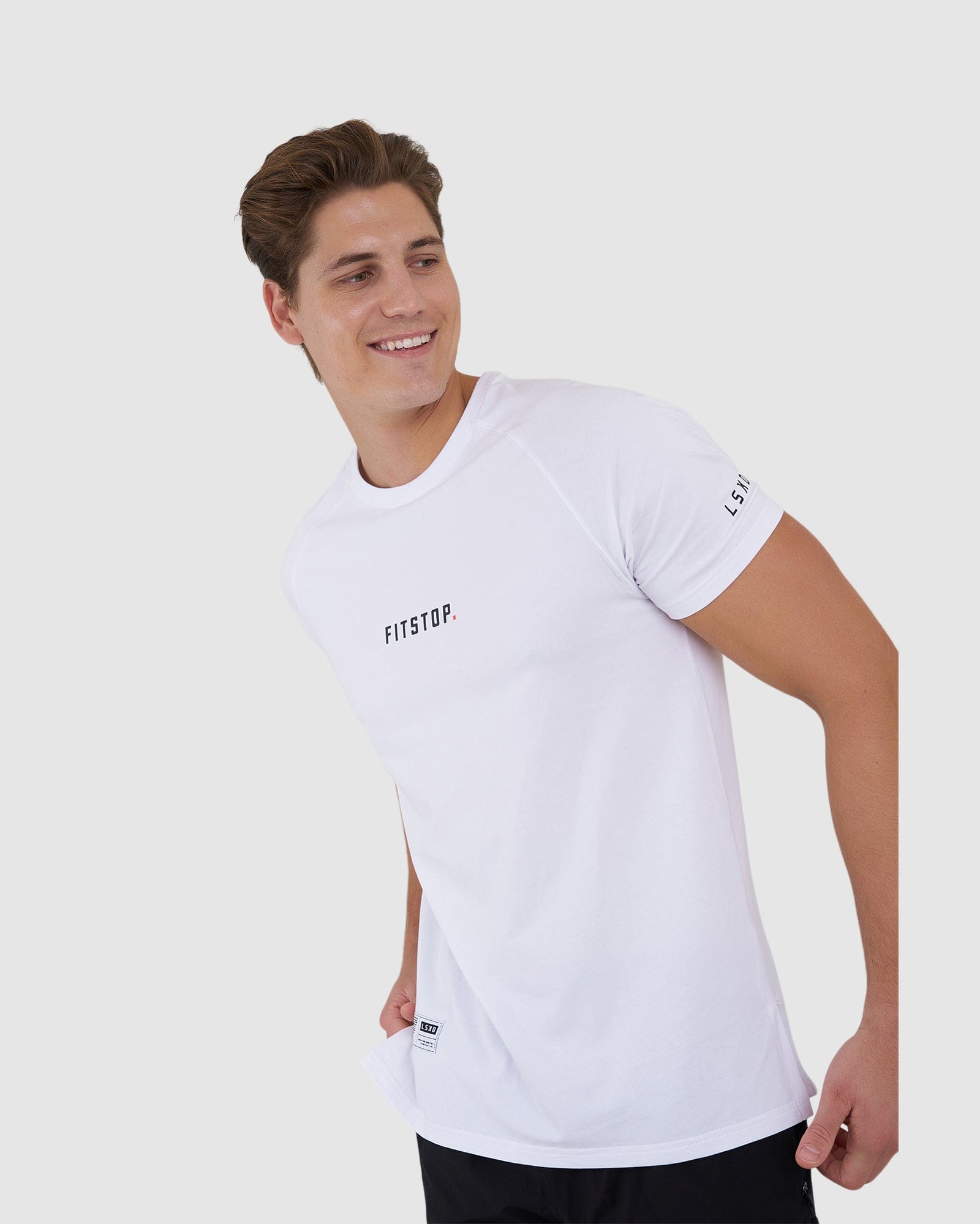 Model wearing Fitstop Optimal Tee - White