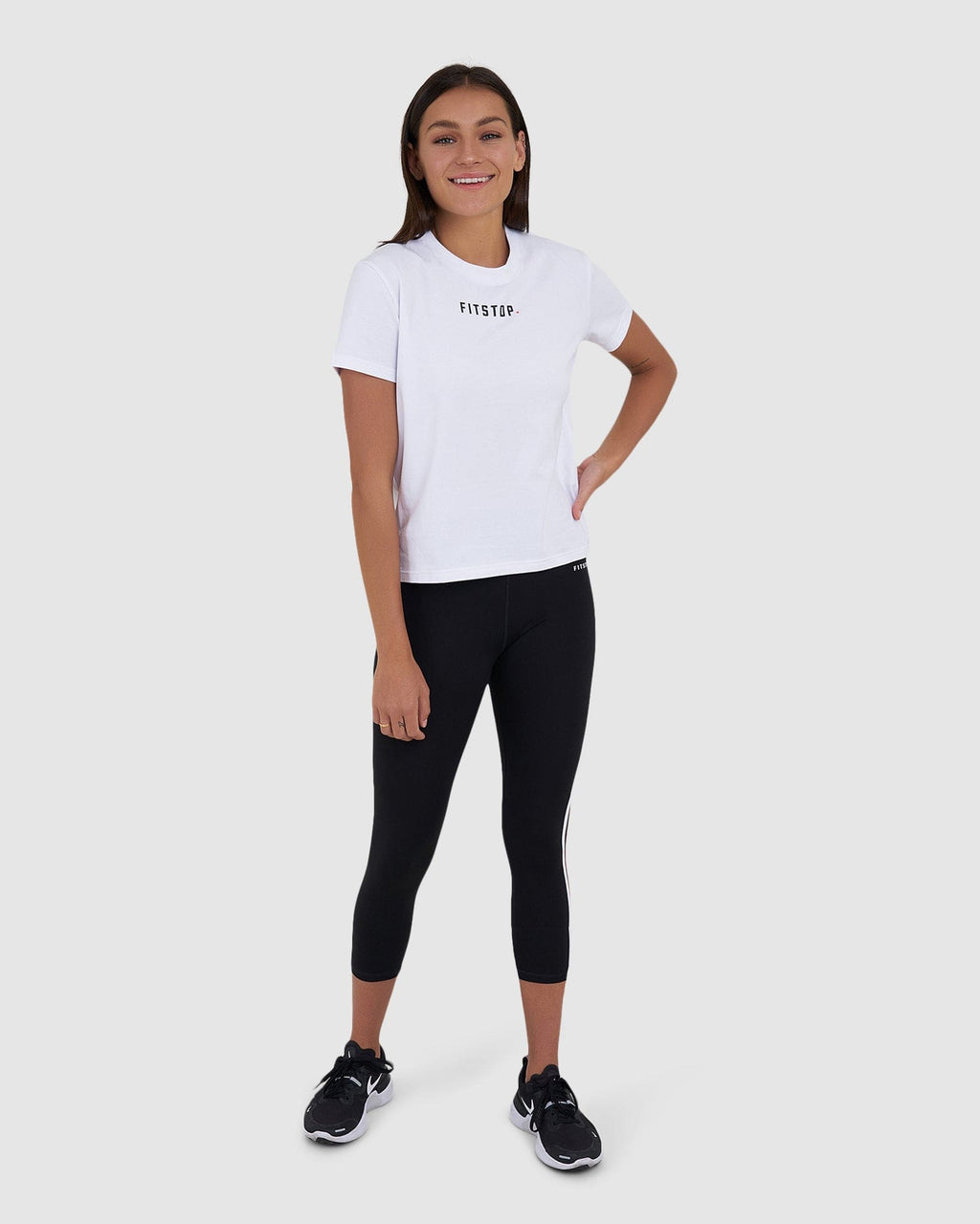 Model wearing Fitstop Fast Tee - White