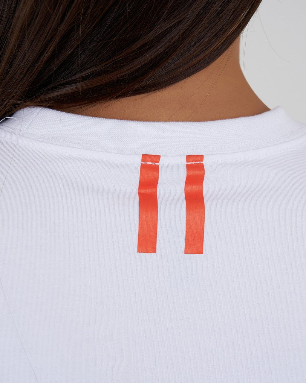 Model wearing Fitstop Fast Tee - White