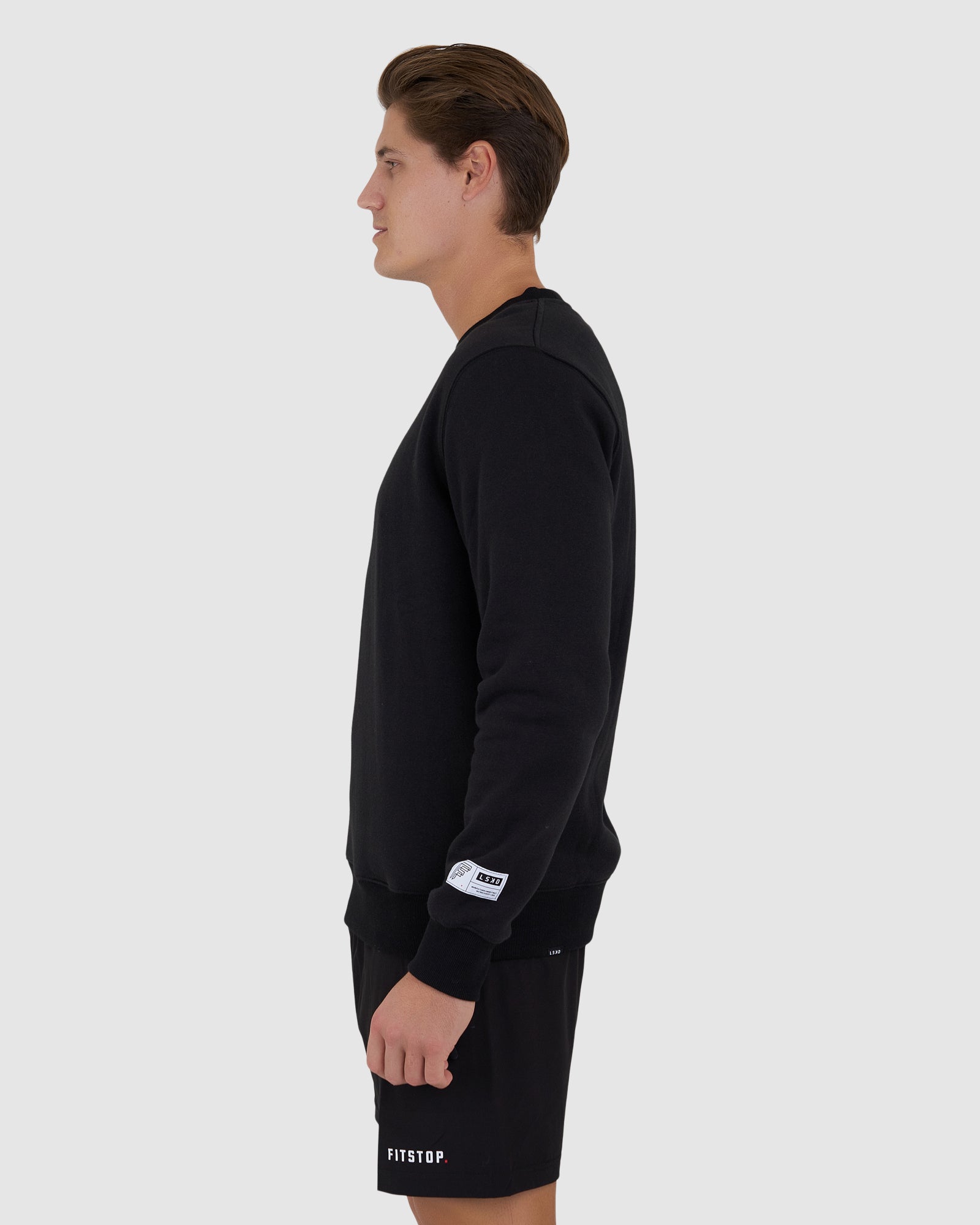 Model wearing Fitstop Functional Sweater - Black