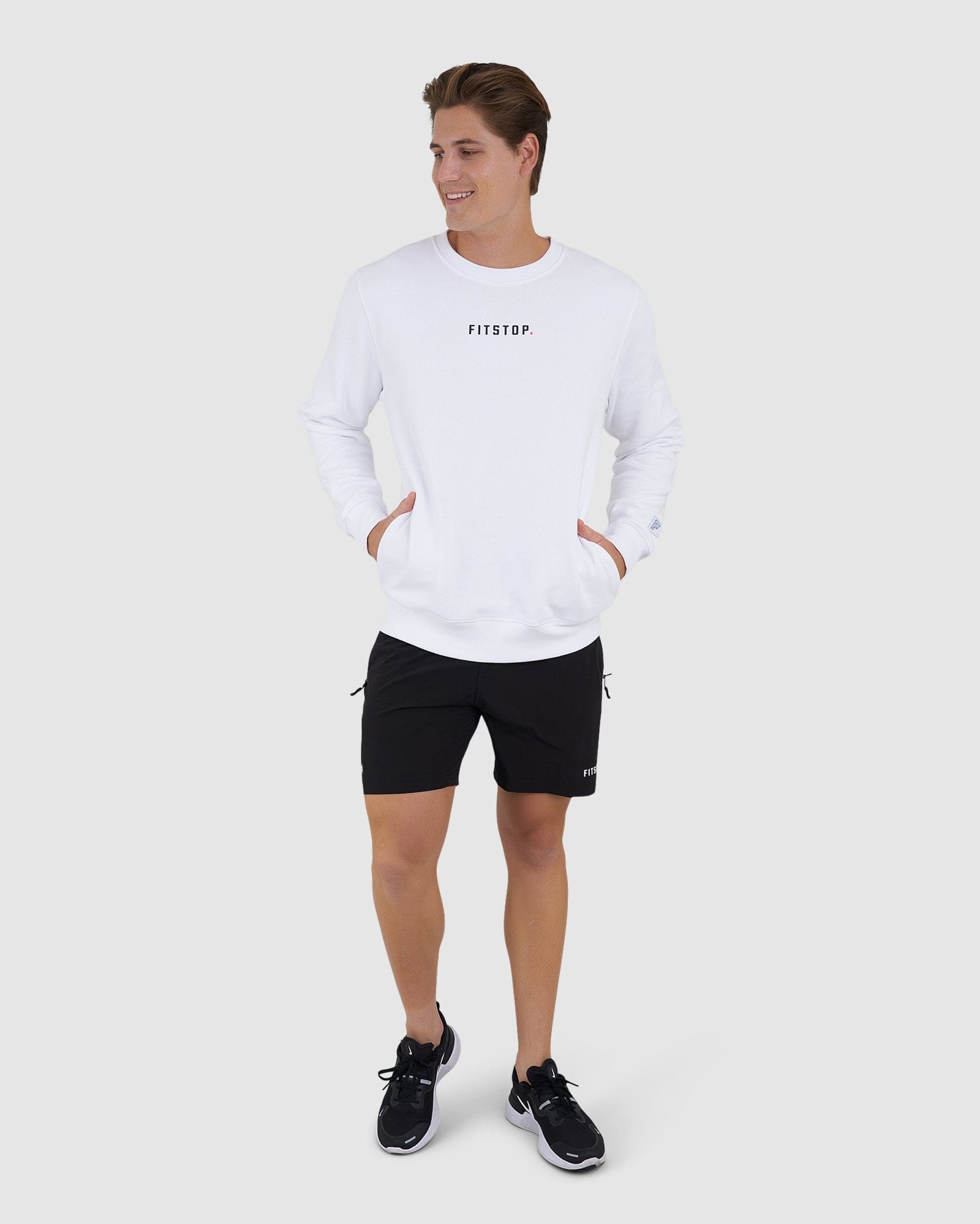 Model wearing Fitstop Functional Sweater - White