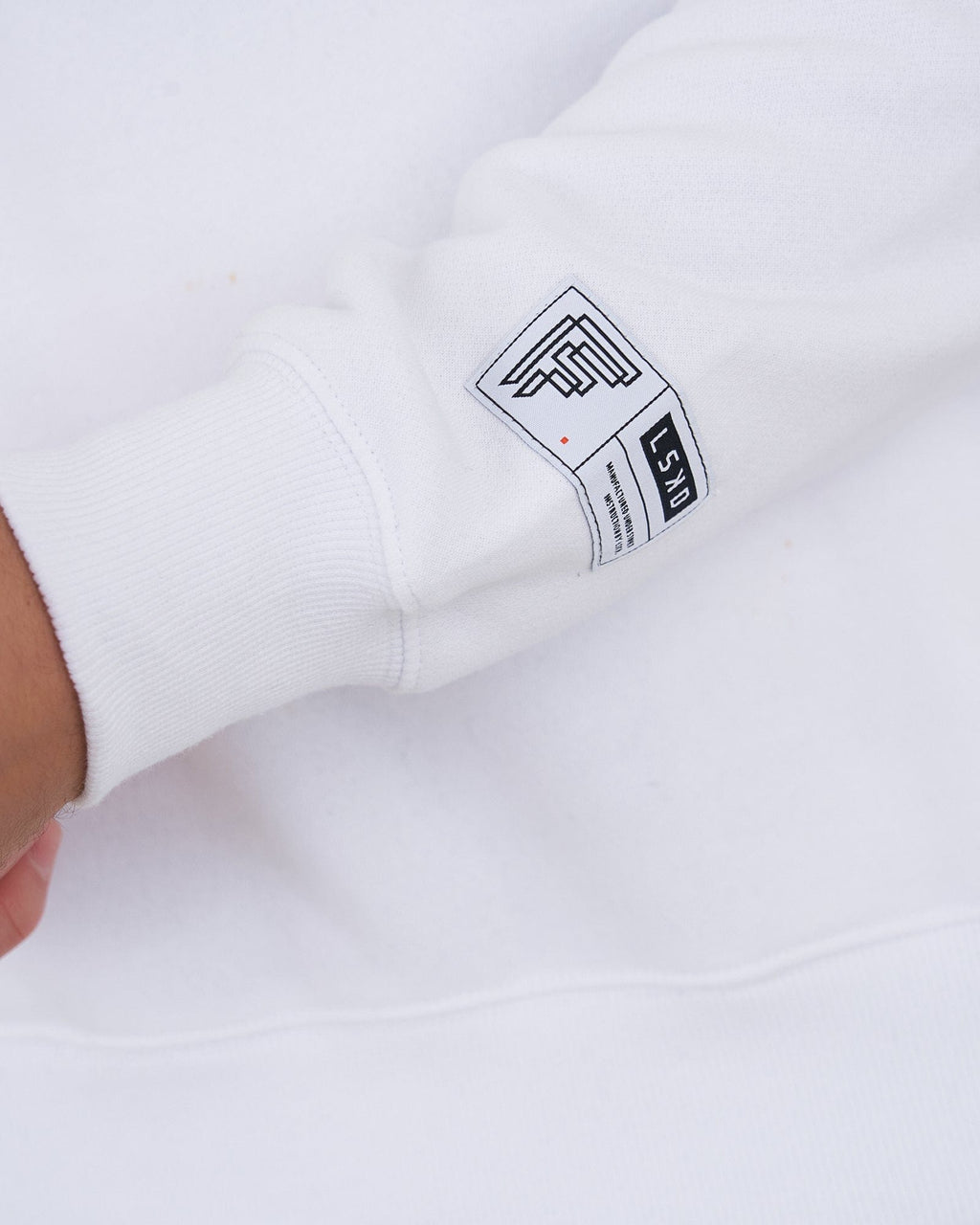 Model wearing Fitstop Functional Sweater - White