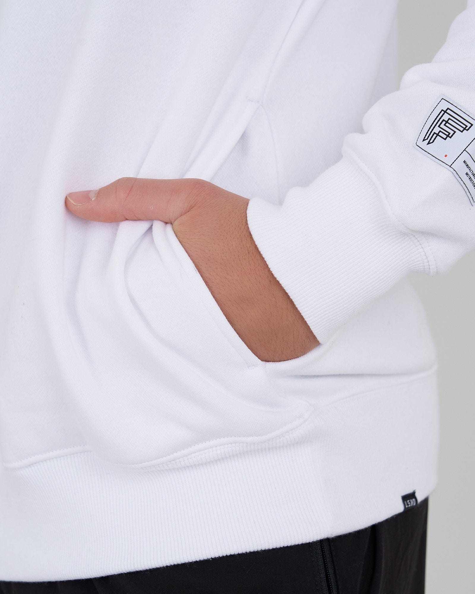 Model wearing Fitstop Functional Sweater - White