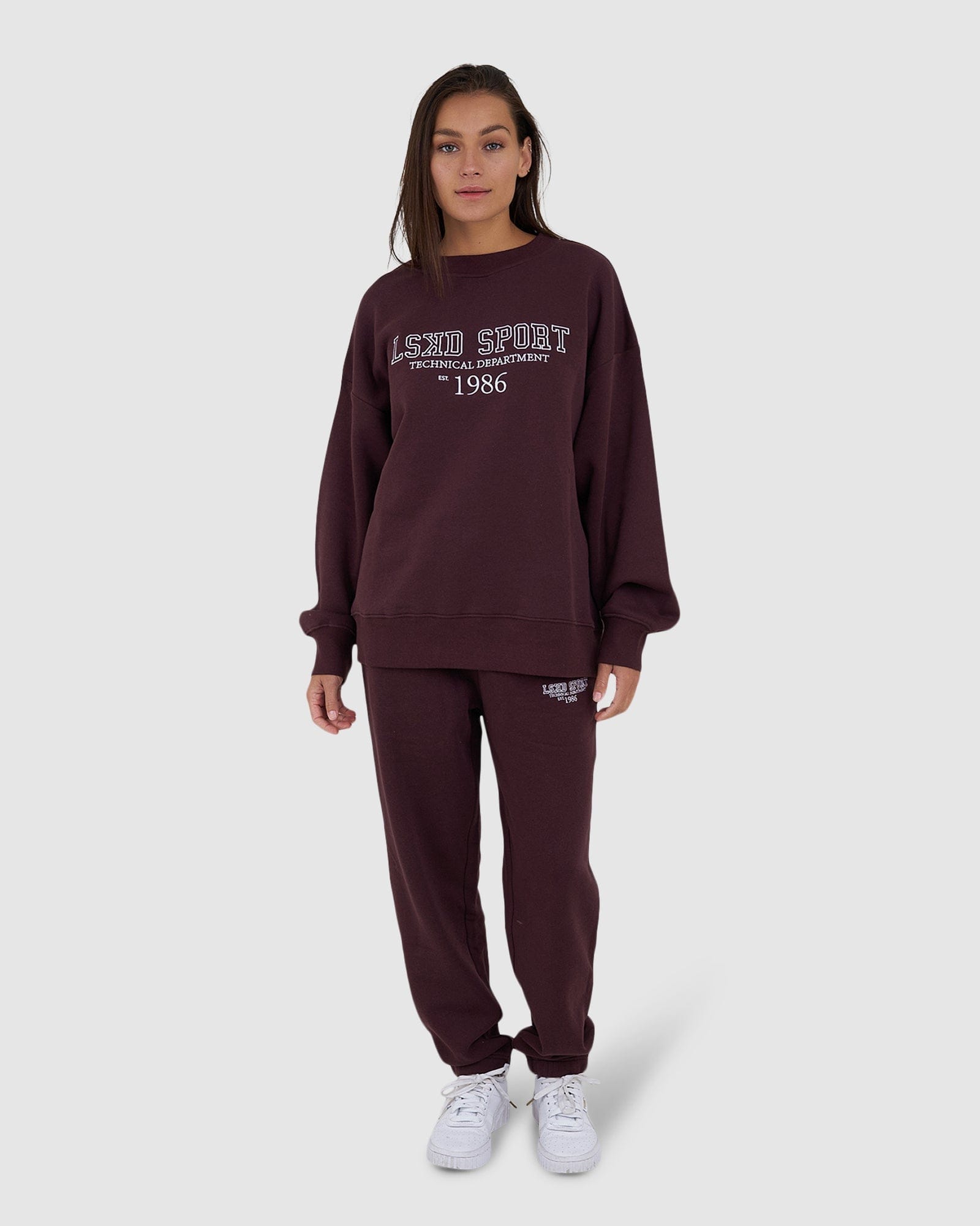 Model wearing Ivy Track Pant - Fudge