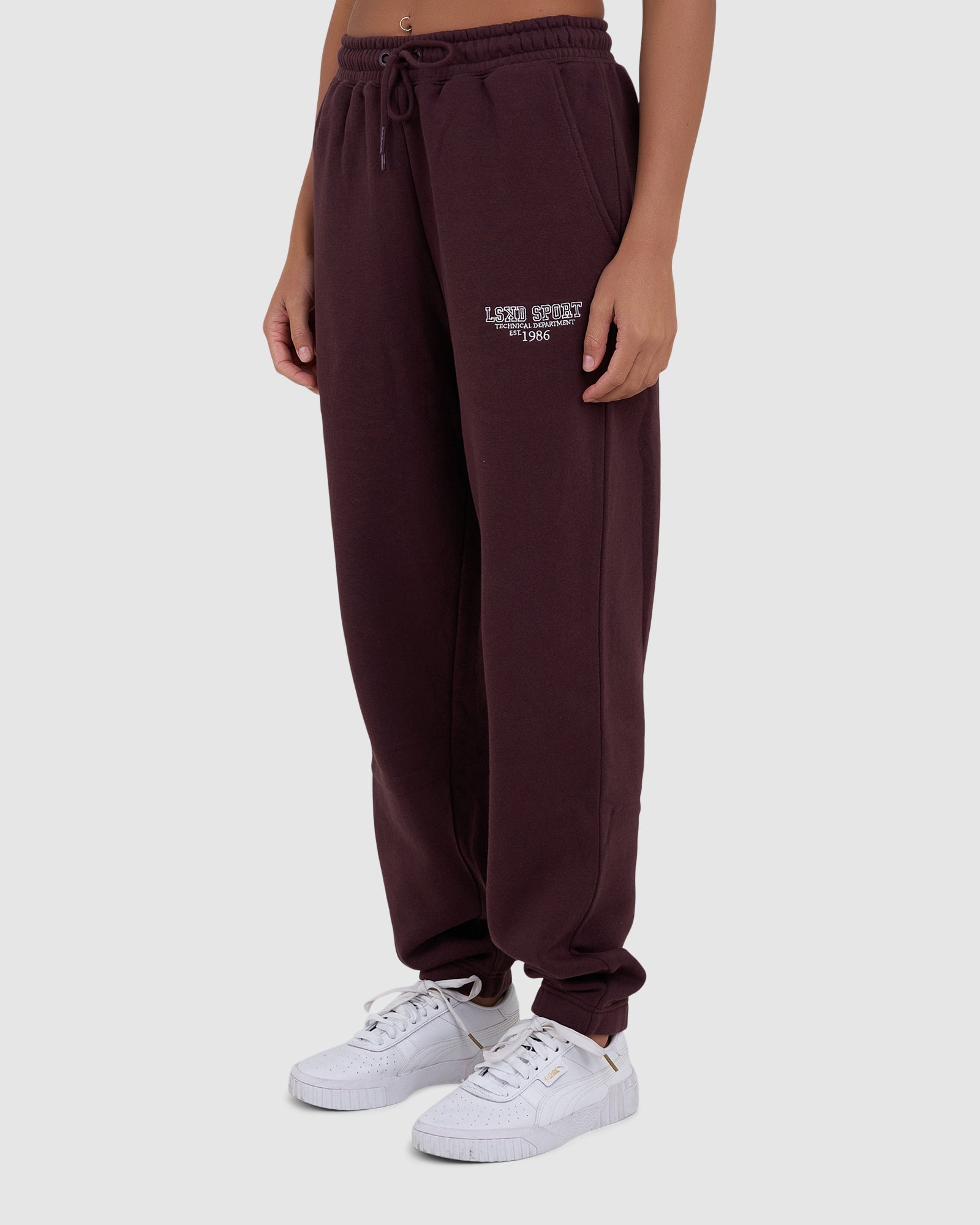 Model wearing Ivy Track Pant - Fudge