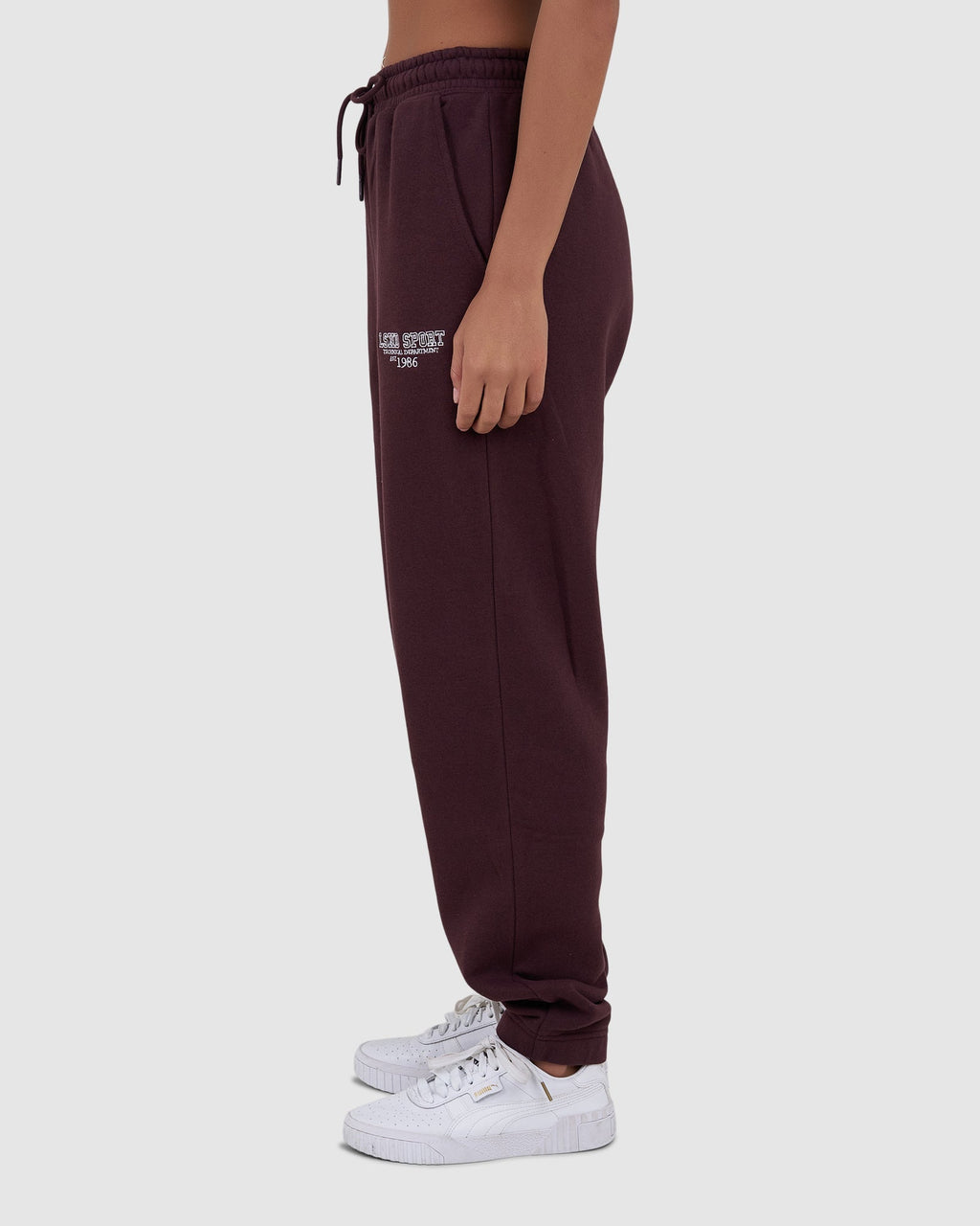Model wearing Ivy Track Pant - Fudge