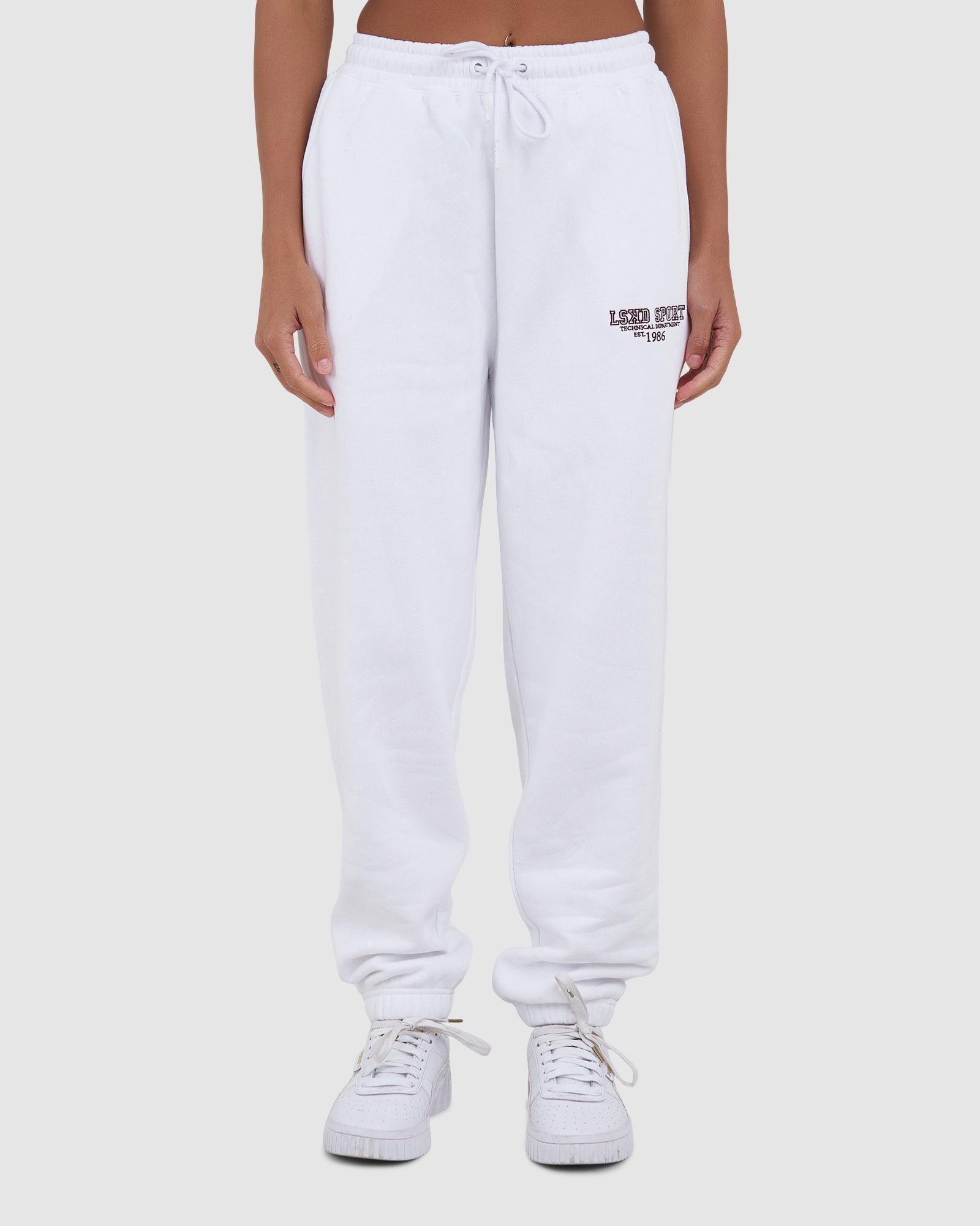 Model wearing Ivy Track Pant - White
