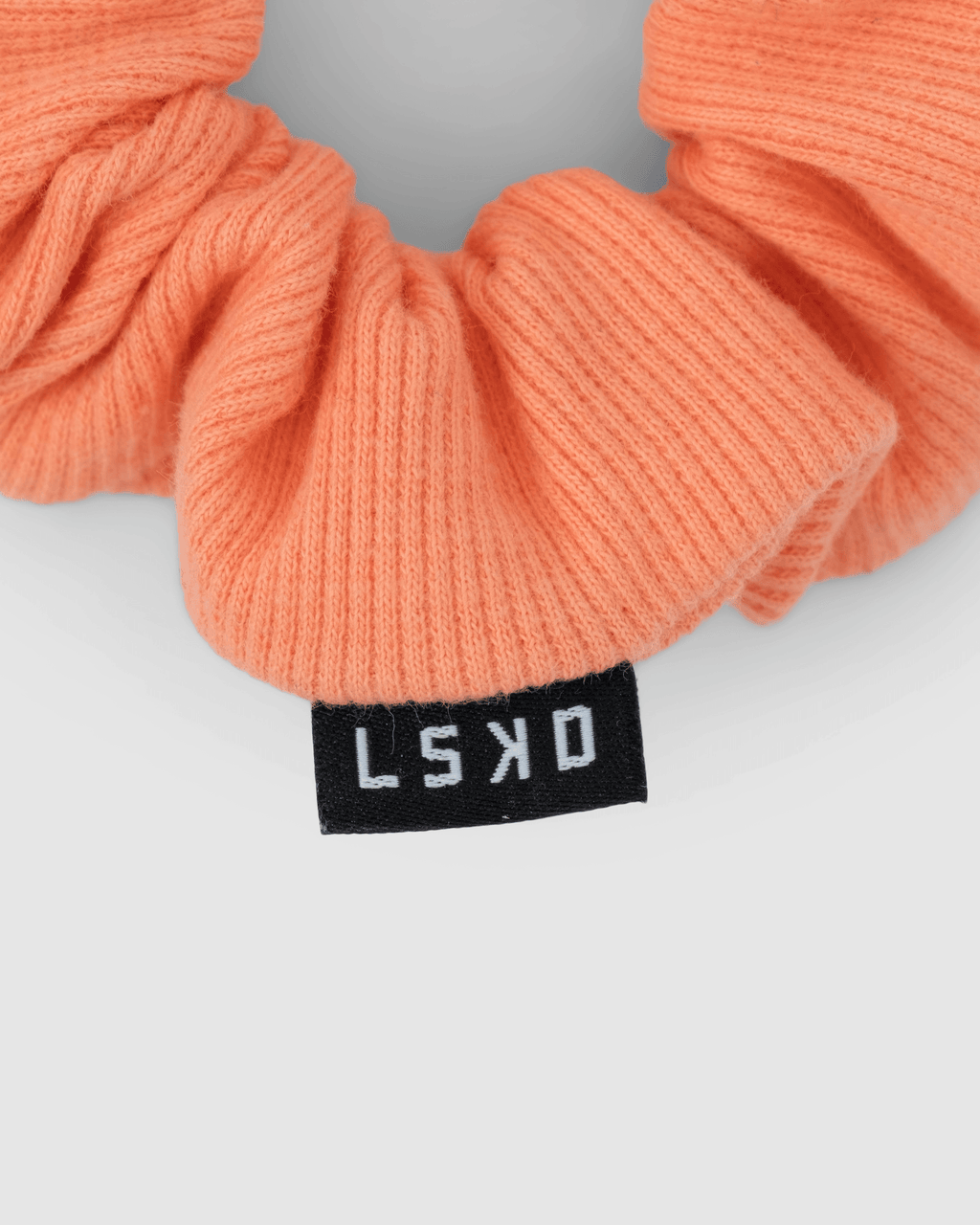 Model wearing Rib Scrunchie - Mandarin