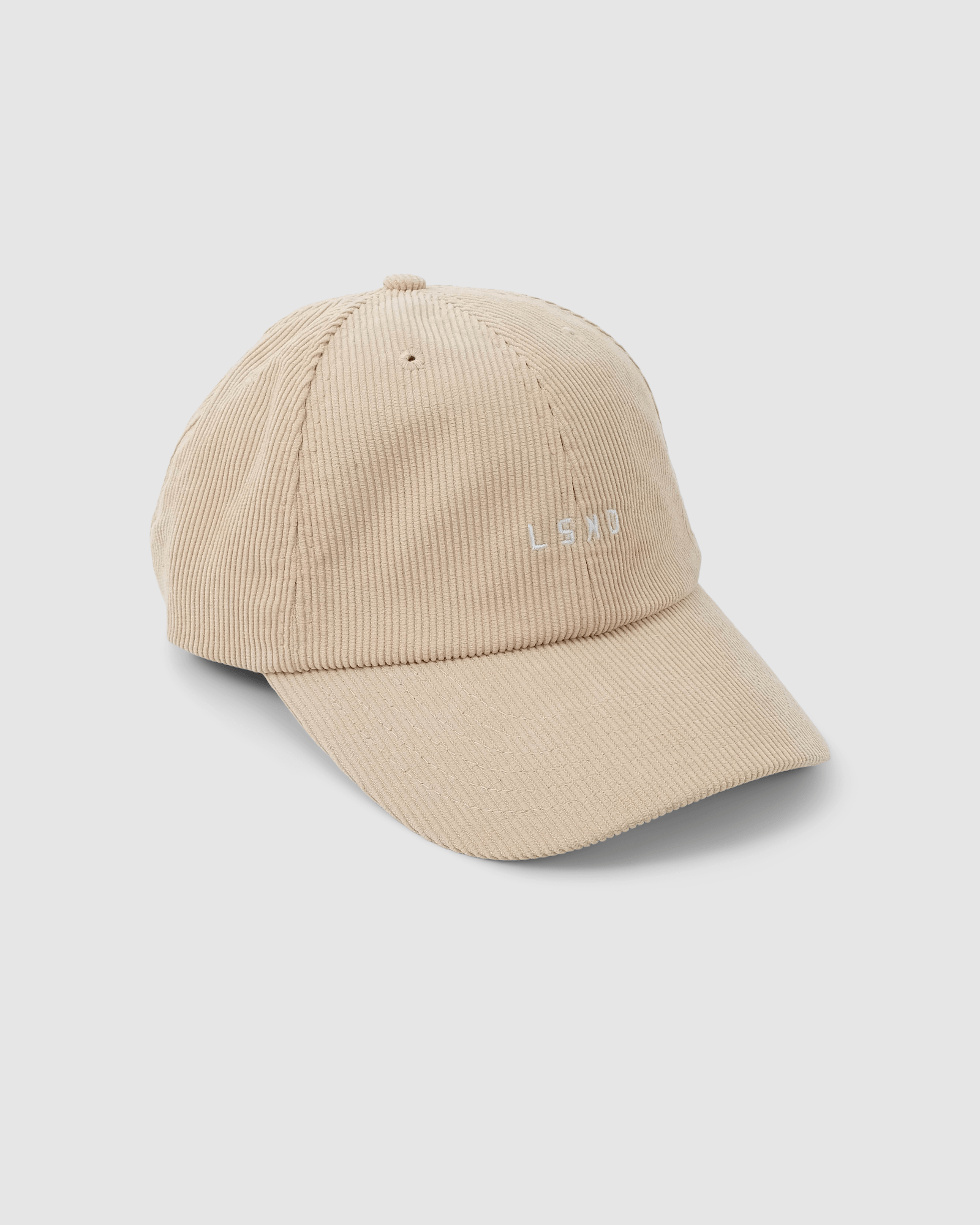 Model wearing Compact Cap - Corduroy Sand