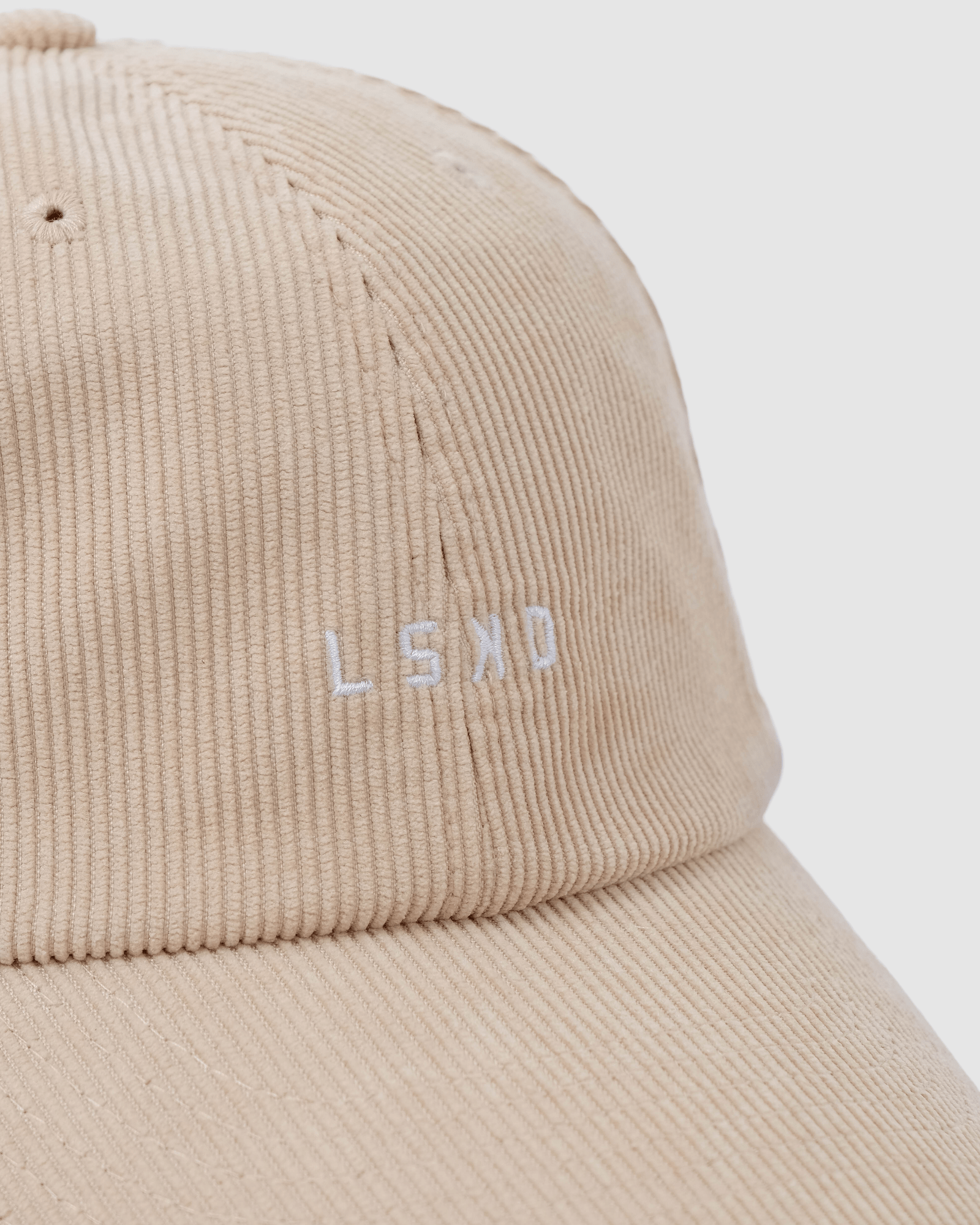 Model wearing Compact Cap - Corduroy Sand