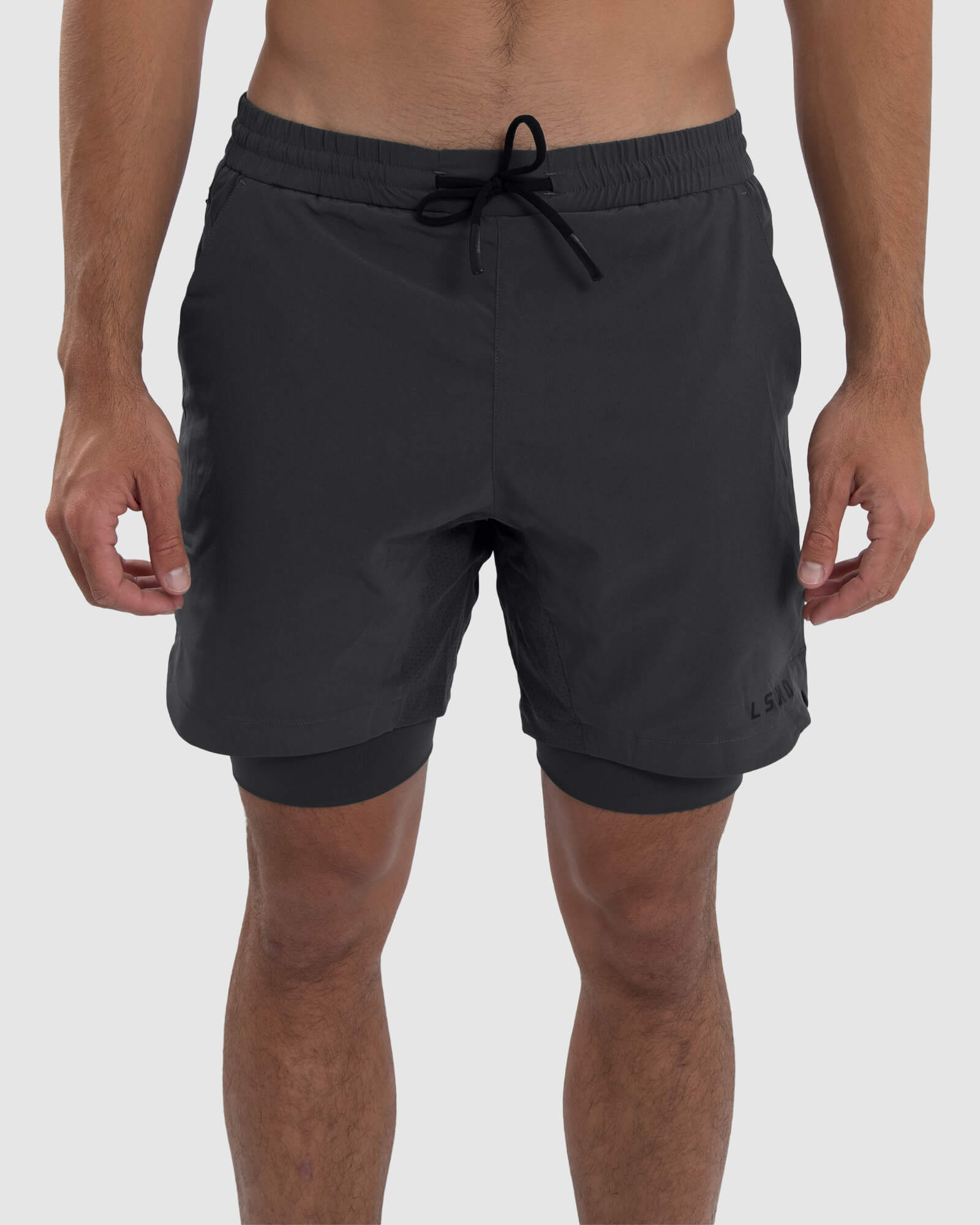 Model wearing Power 7" Performance Liner Short - Asphalt