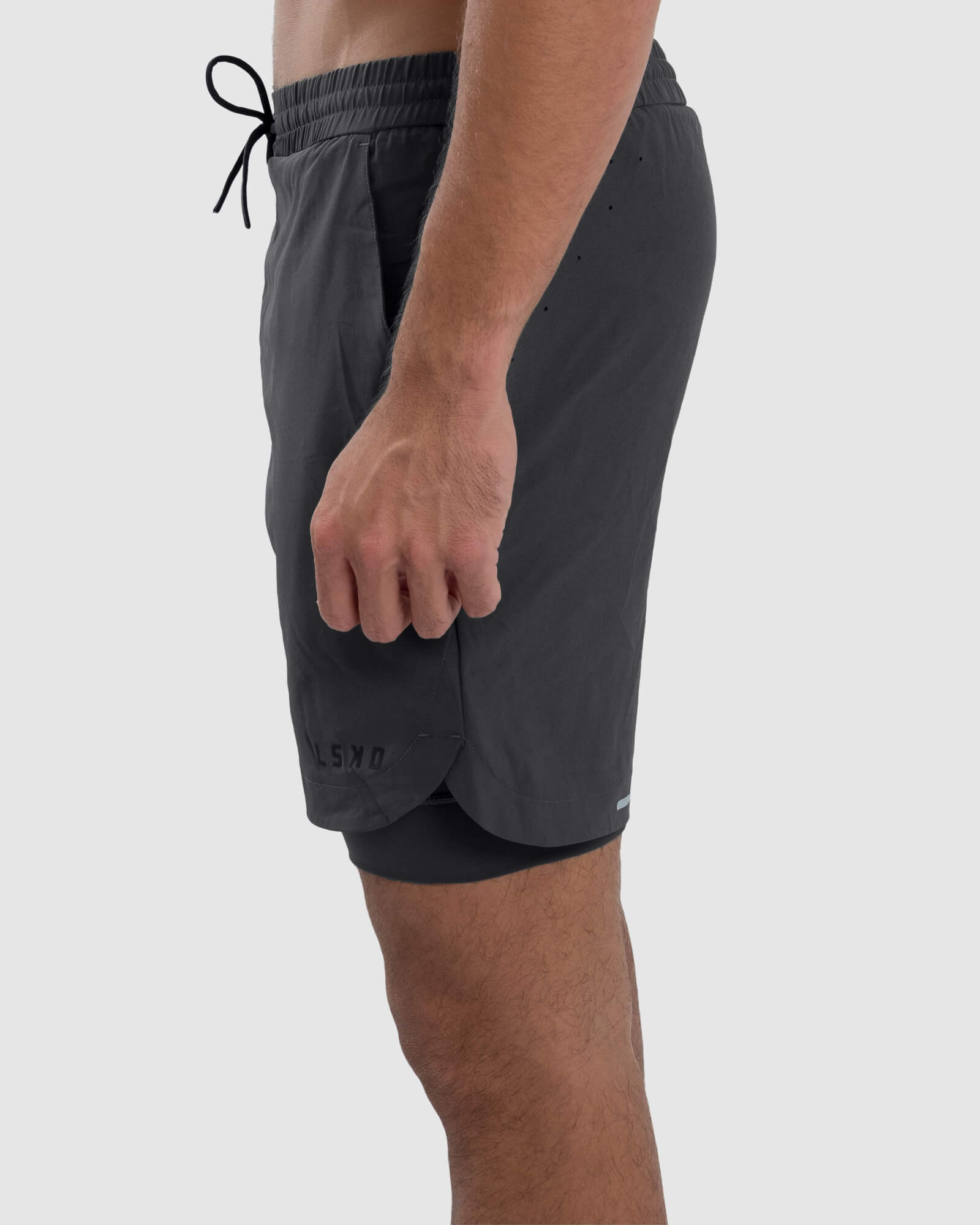 Model wearing Power 7" Performance Liner Short - Asphalt