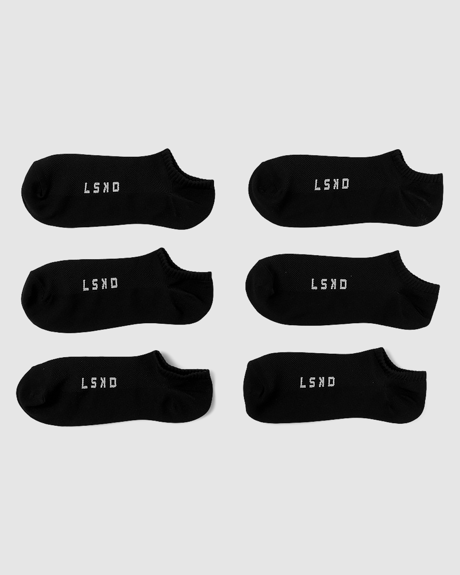 Model wearing Mens Covert Sock - 3 Pack - Black