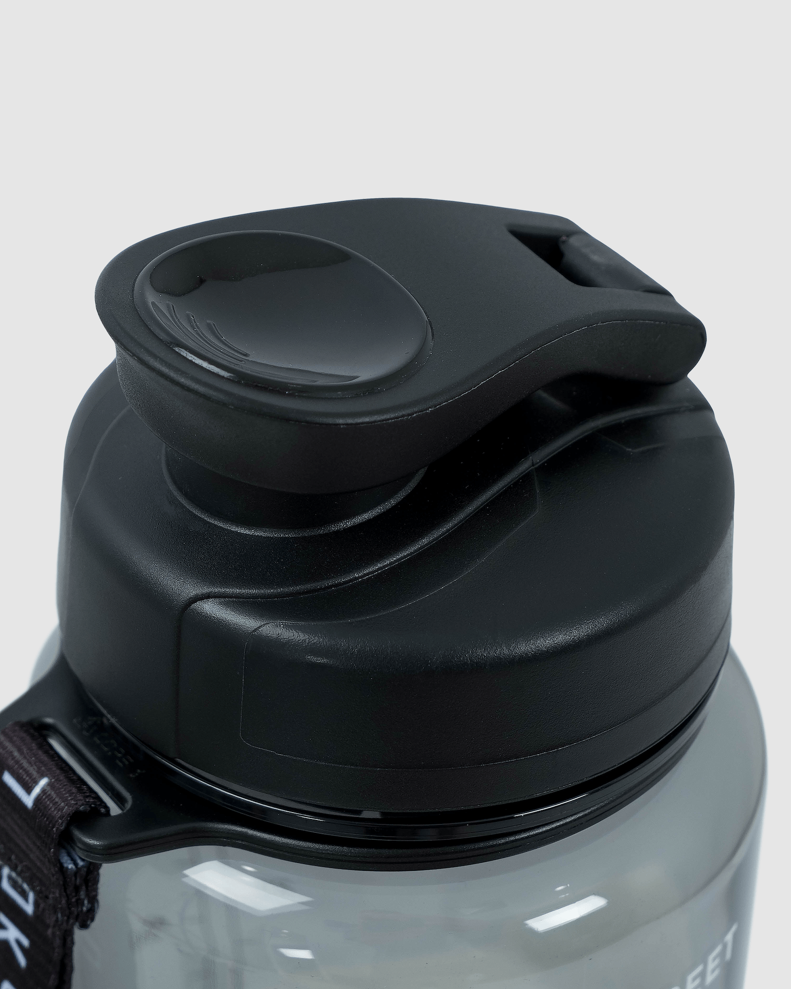 Model wearing Rep 1L Plastic Bottle - Black