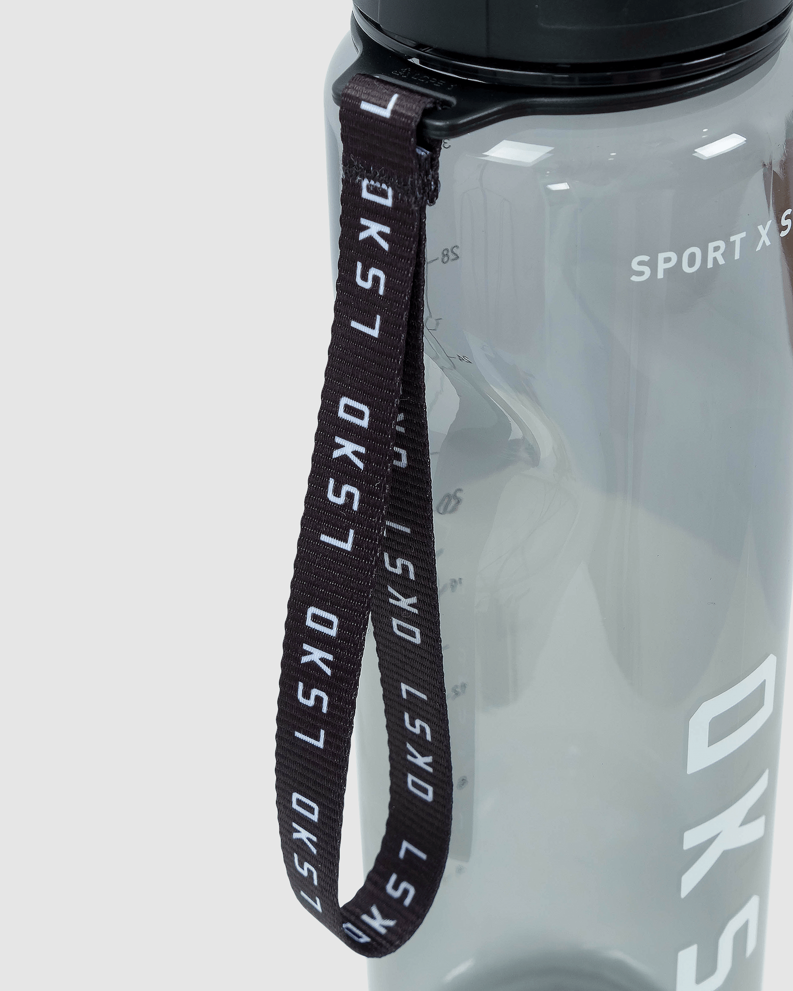 Model wearing Rep 1L Plastic Bottle - Black