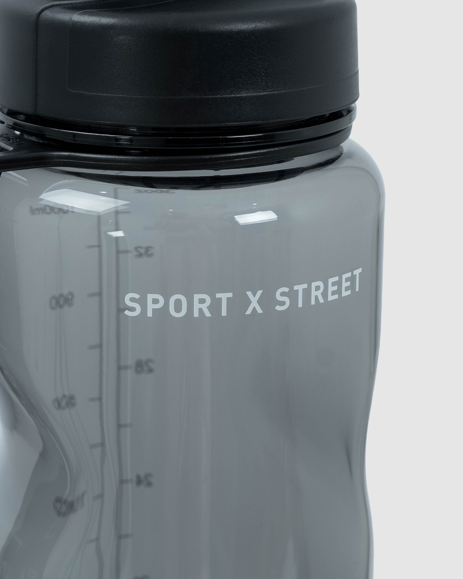 Model wearing Rep 1L Plastic Bottle - Black