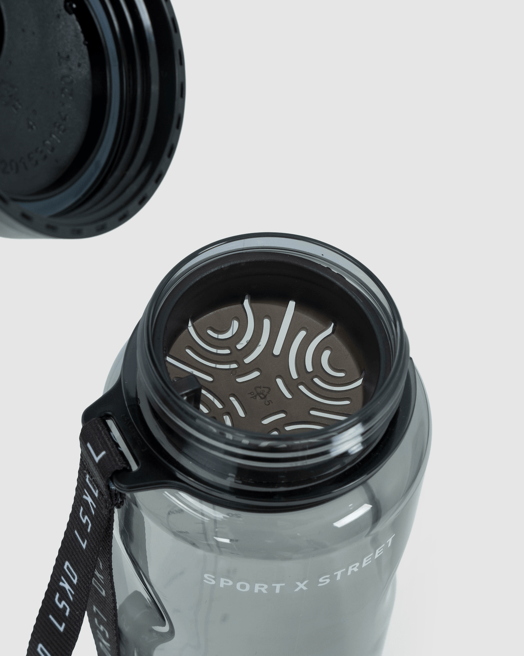 Model wearing Rep 1L Plastic Bottle - Black