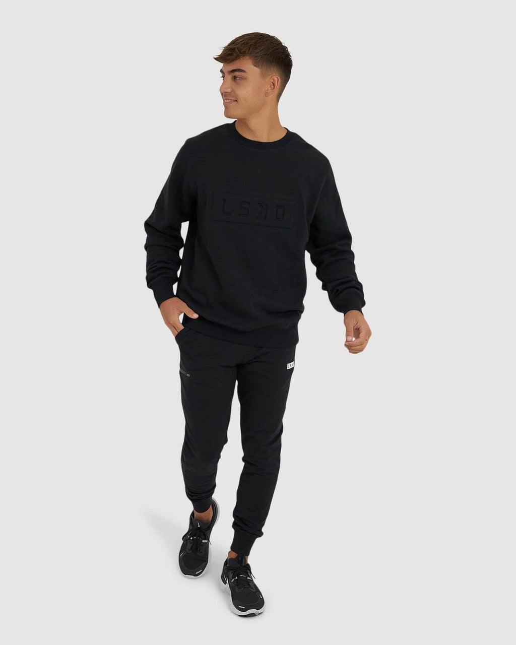 Model wearing Imprint Sweater - Black