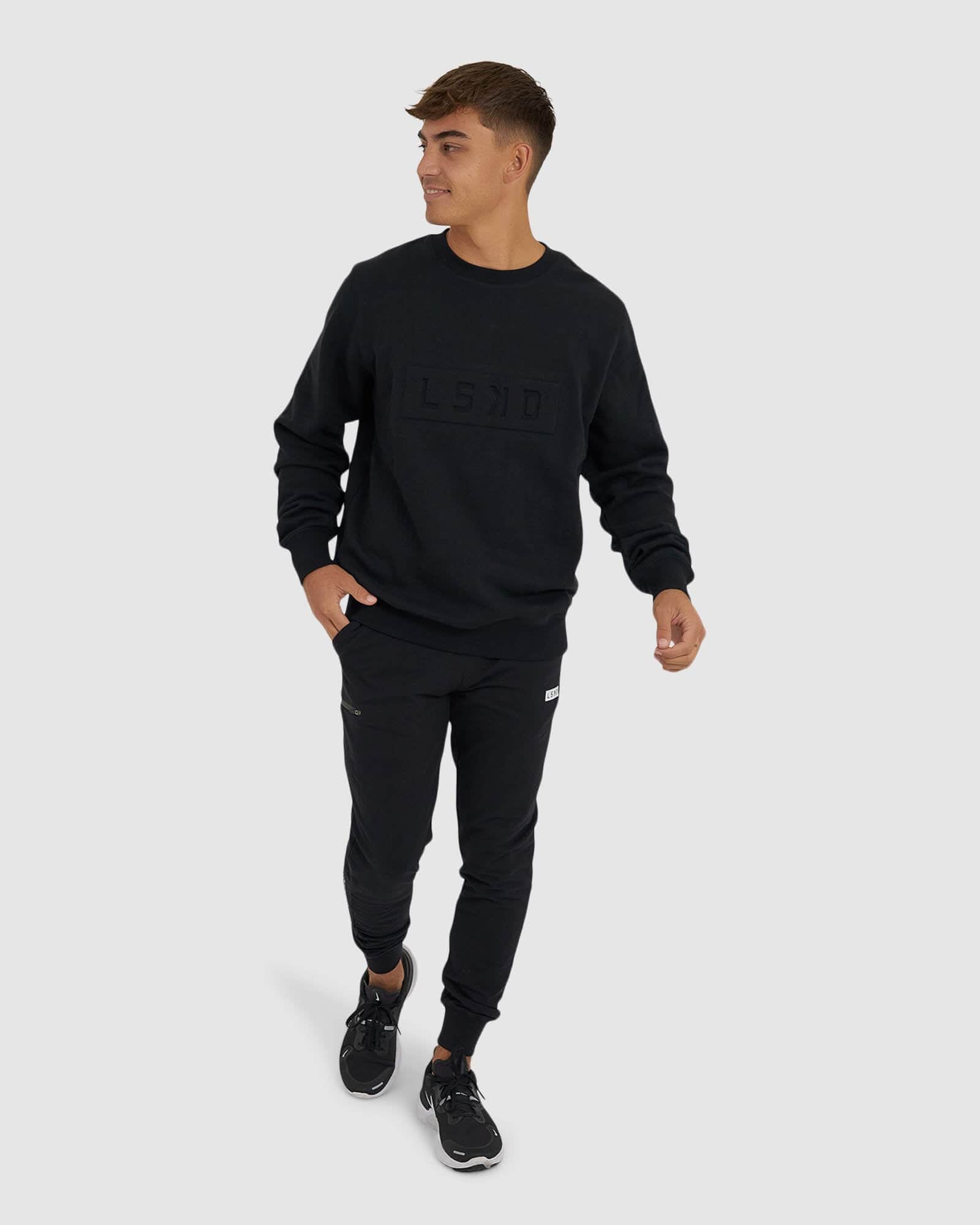 Model wearing Imprint Sweater - Black