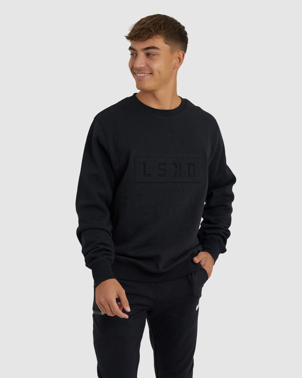 Model wearing Imprint Sweater - Black