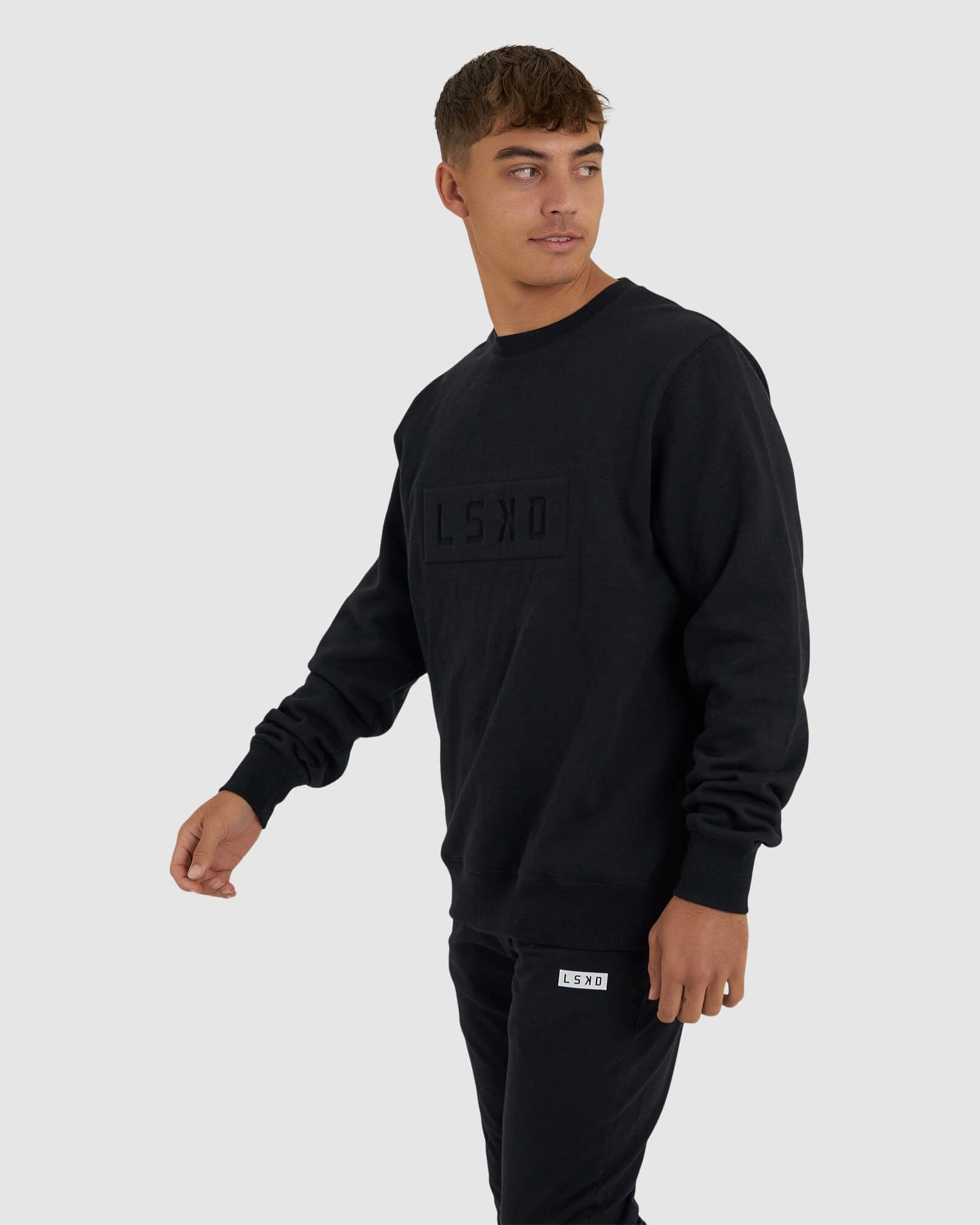 Model wearing Imprint Sweater - Black