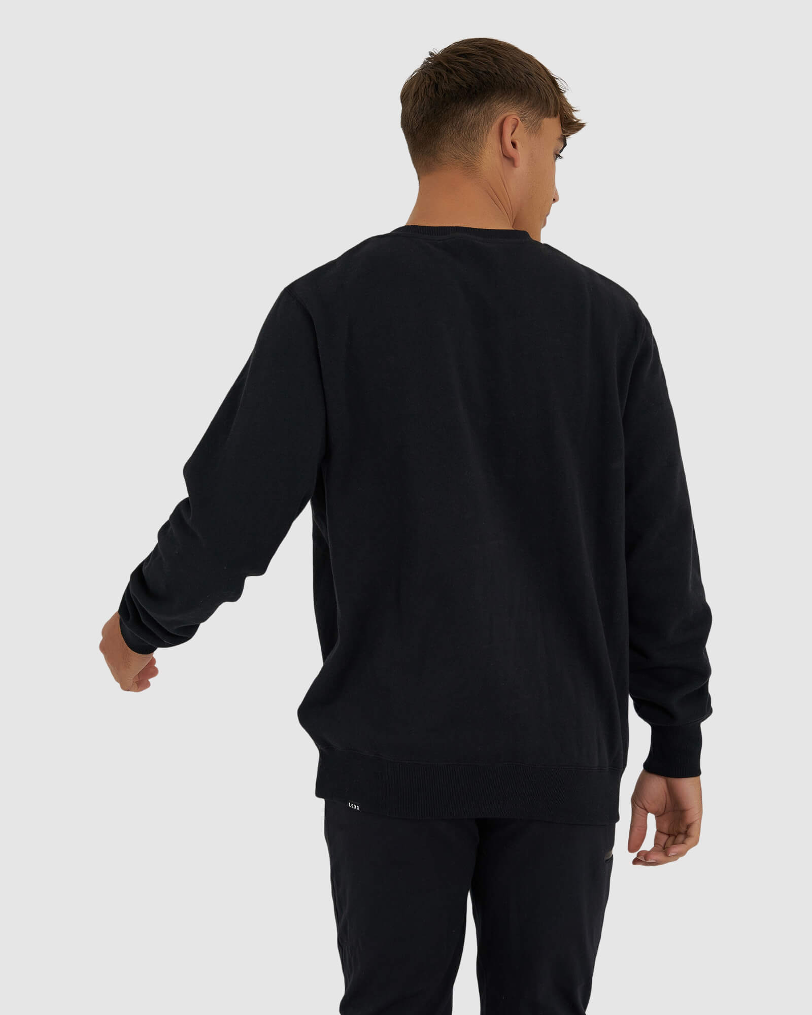 Model wearing Imprint Sweater - Black