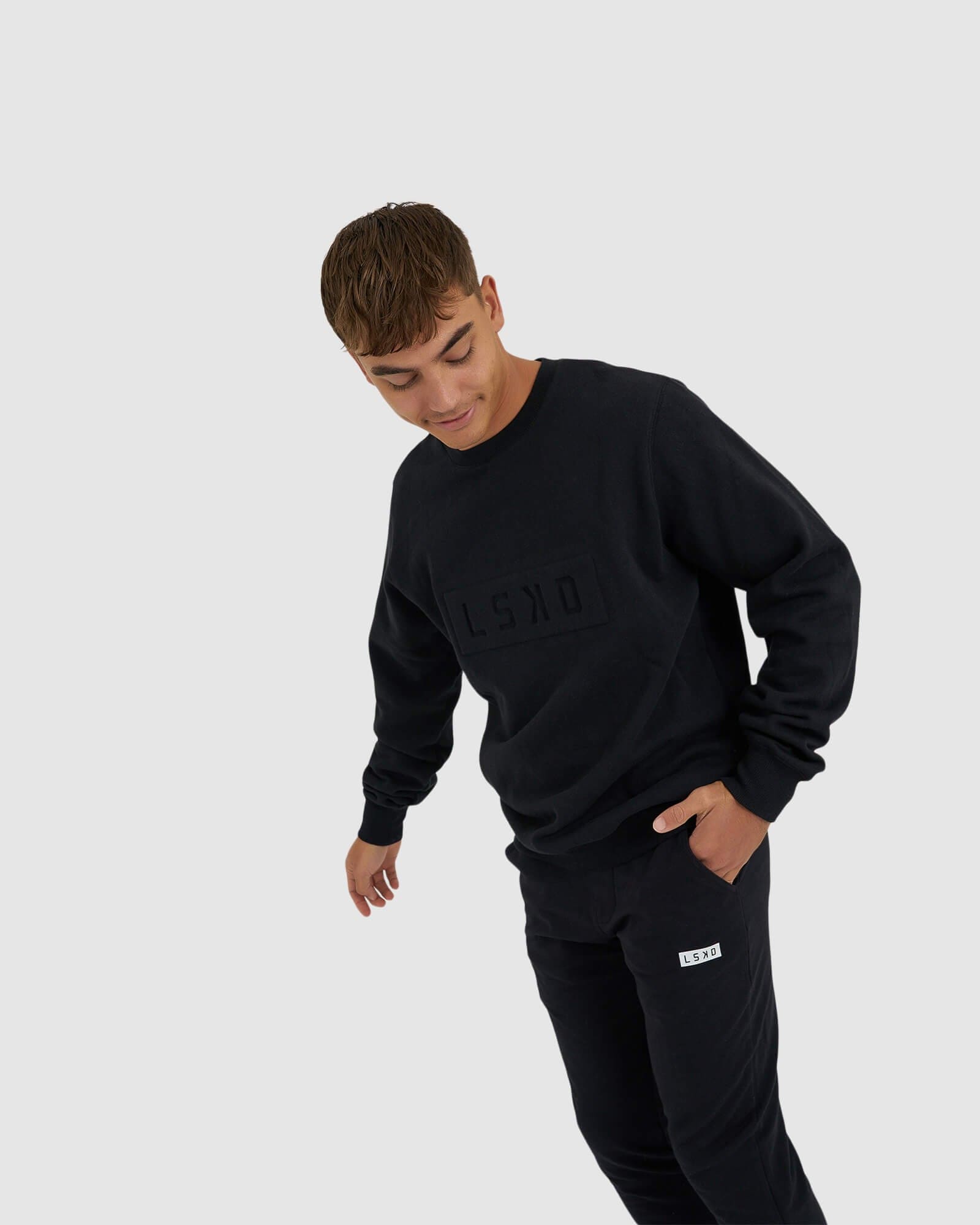 Model wearing Imprint Sweater - Black