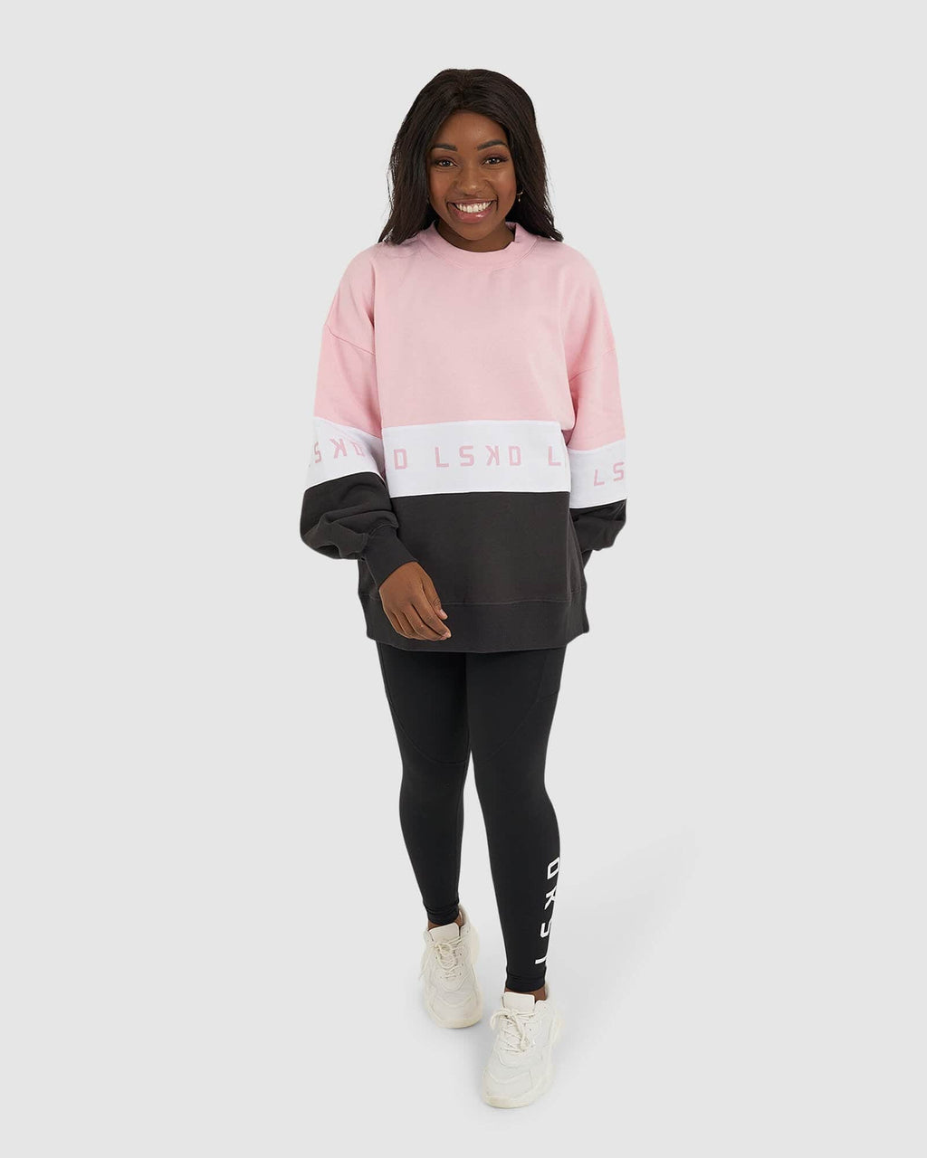 Model wearing Disc Sweater Oversize - Petal Pink