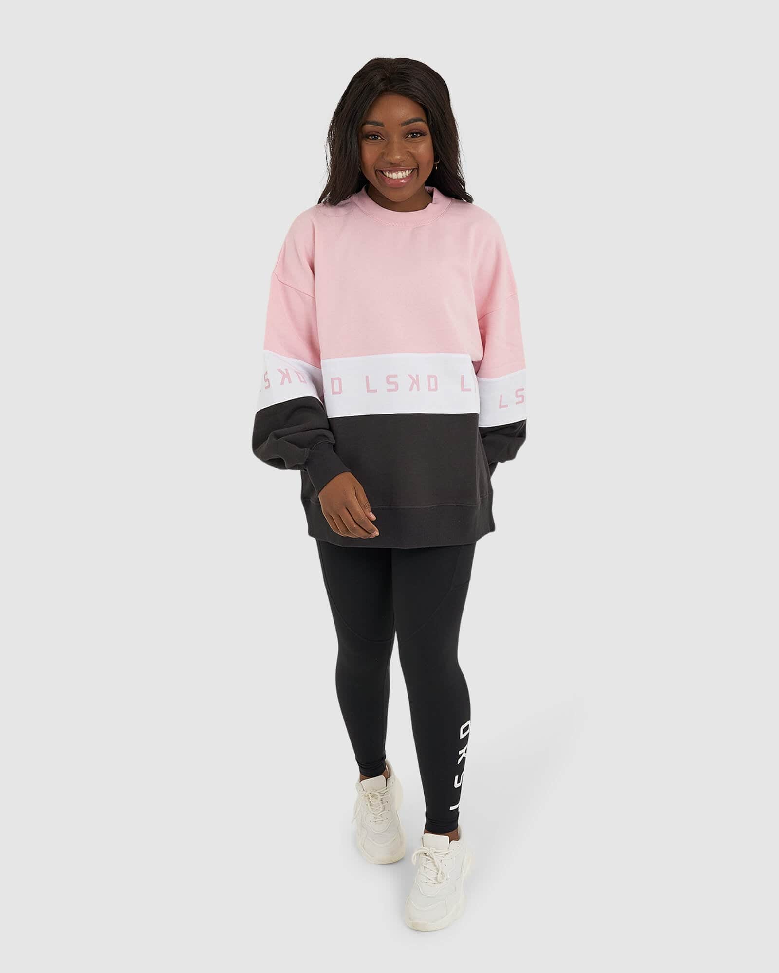 Model wearing Disc Sweater Oversize - Petal Pink