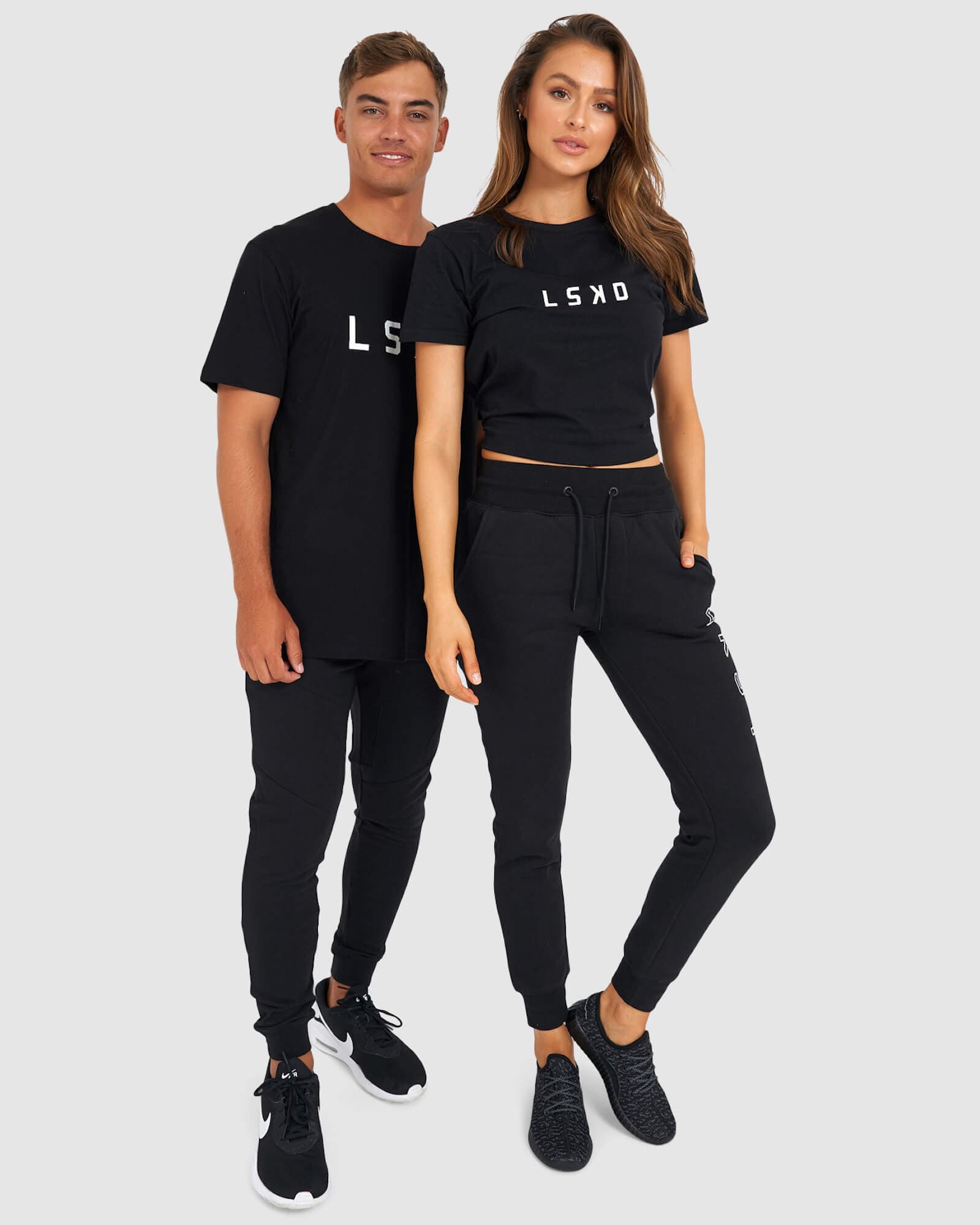 Model wearing Unisex Rep Jogger - Black