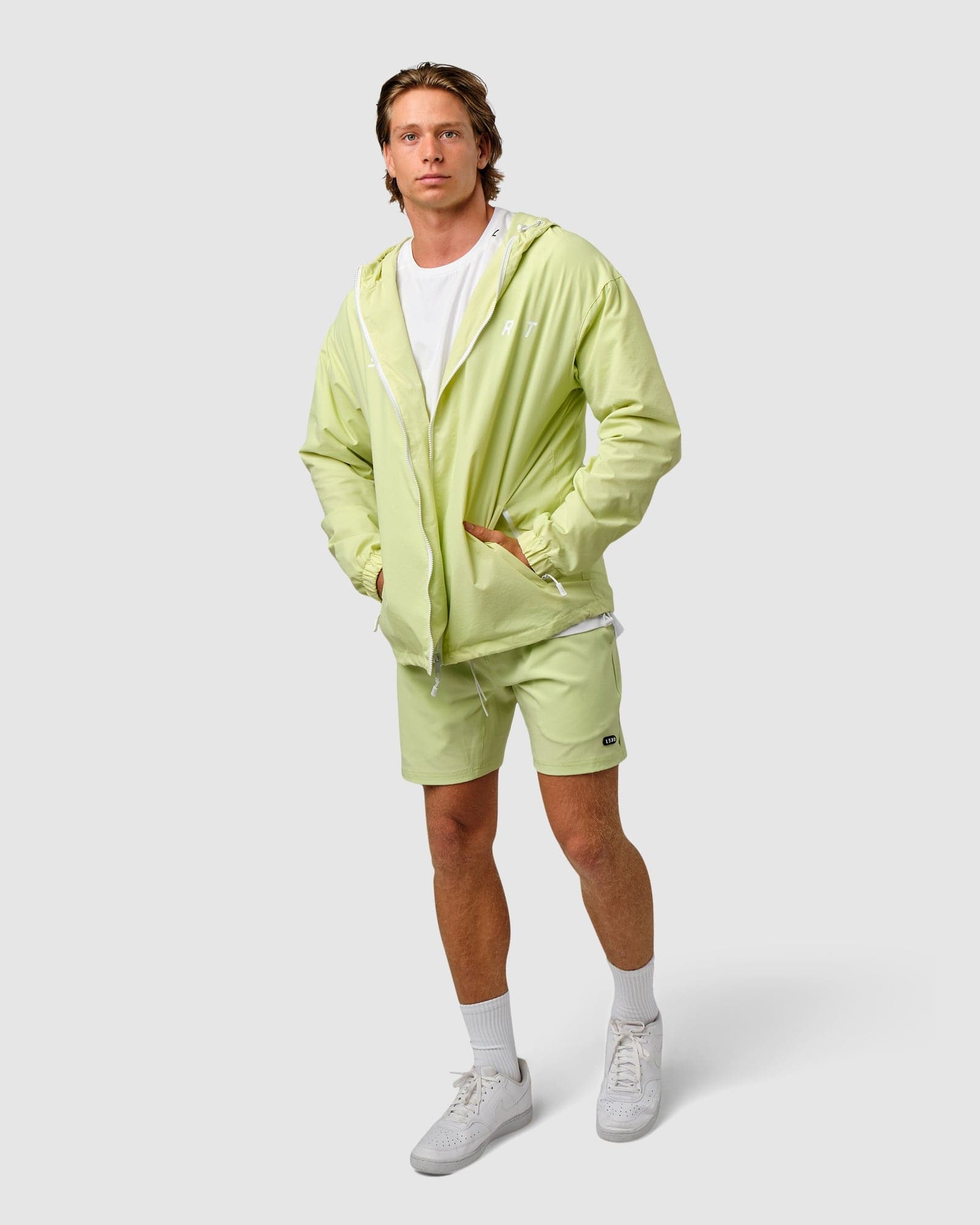 Model wearing Drill Track Jacket Oversize - Pastel Lime