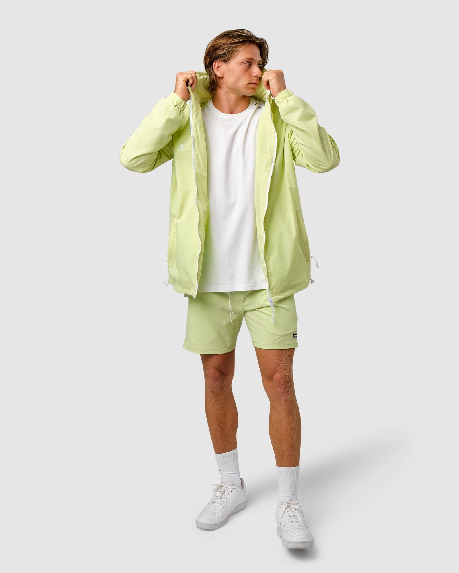 Model wearing Unisex Drill Track Jacket Oversize - Pastel Lime