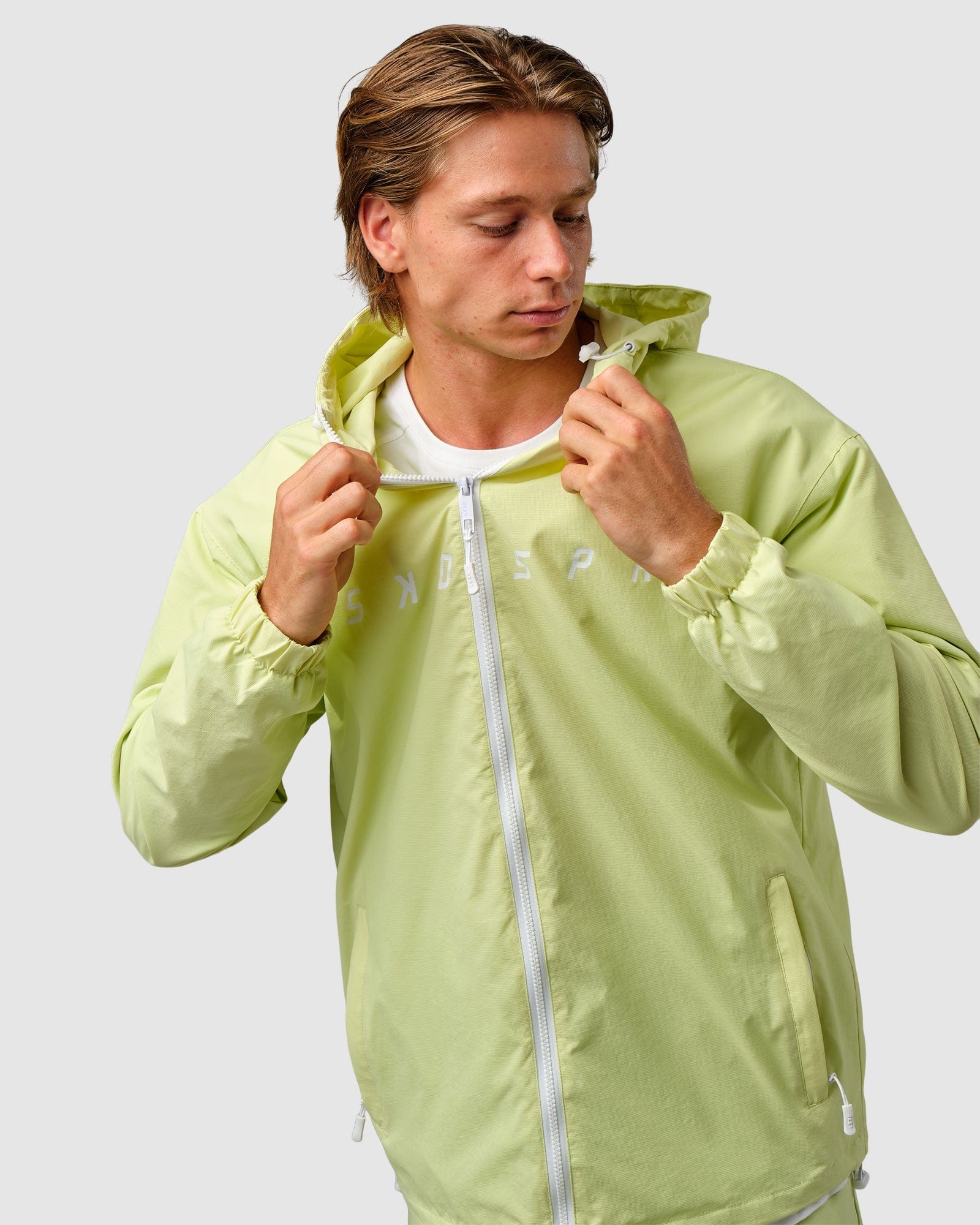 Model wearing Unisex Drill Track Jacket Oversize - Pastel Lime