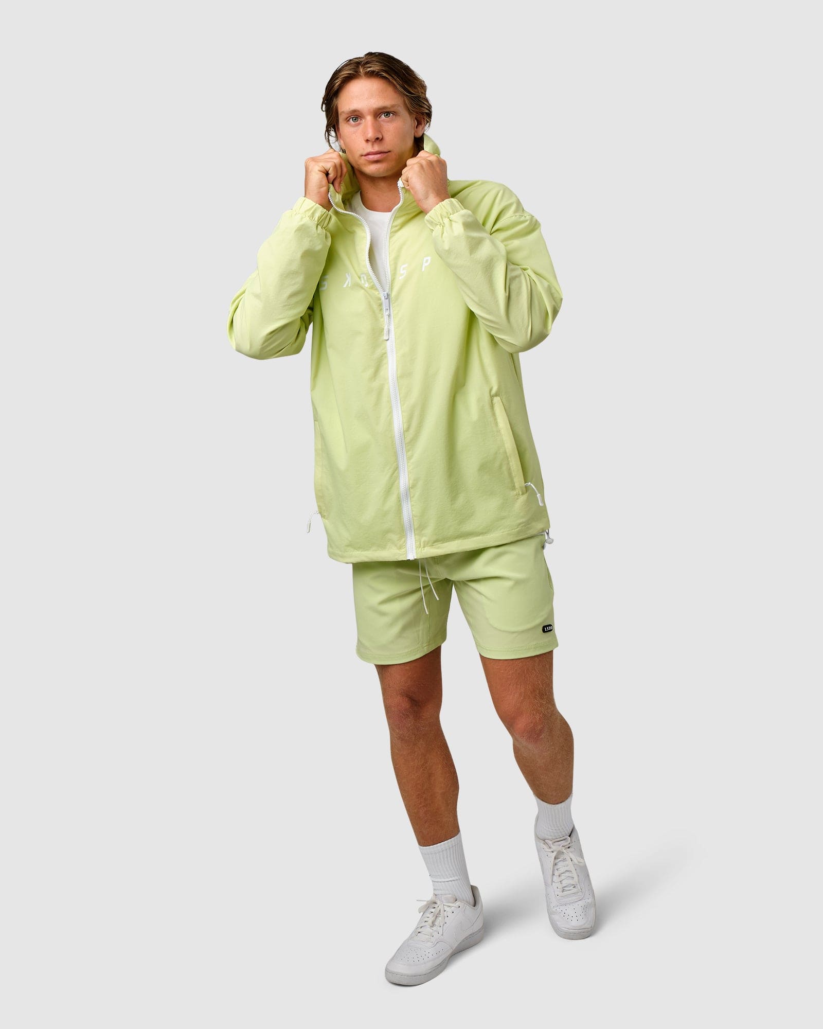 Model wearing Drill Track Jacket Oversize - Pastel Lime