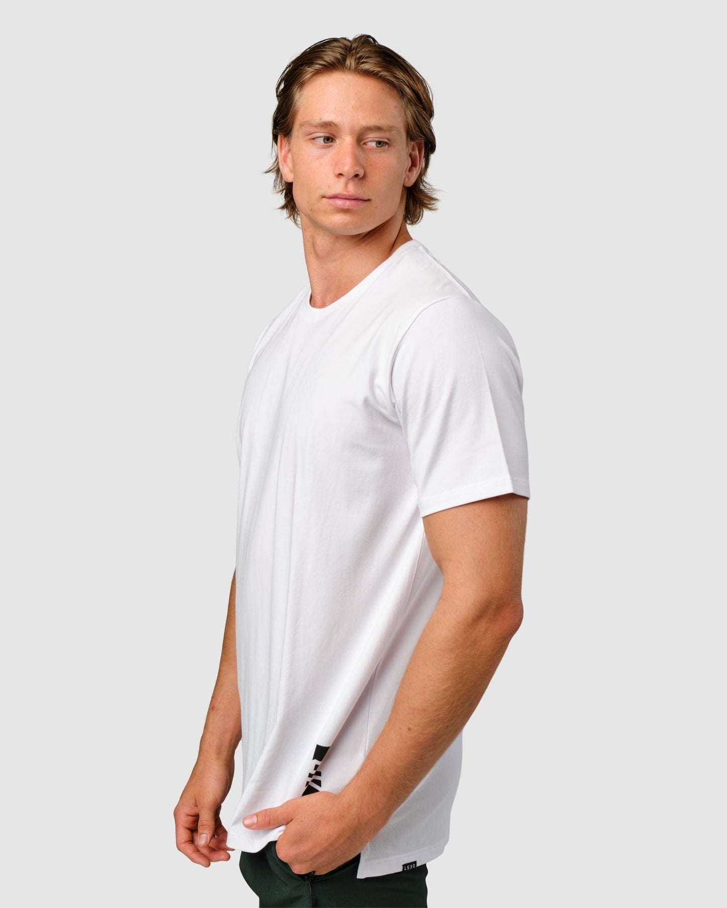 Model wearing Feature Tee - White