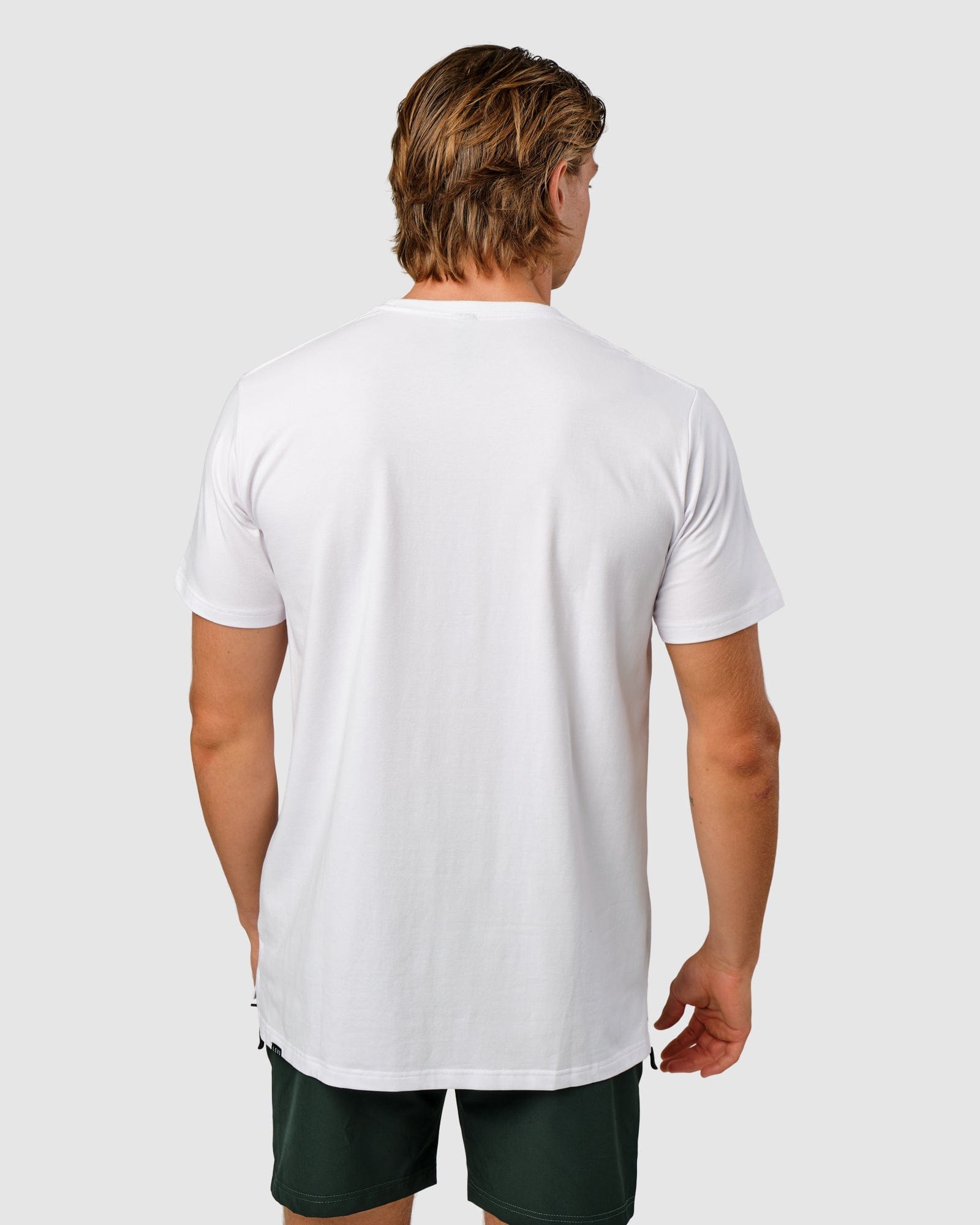 Model wearing Feature Tee - White