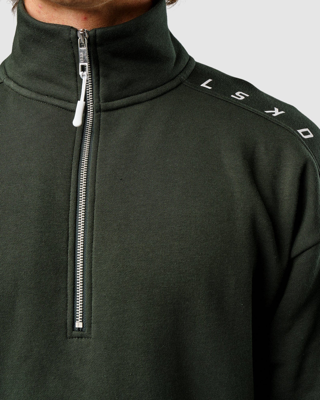 Model wearing Competitor 1/4 Zip Sweater - Forest