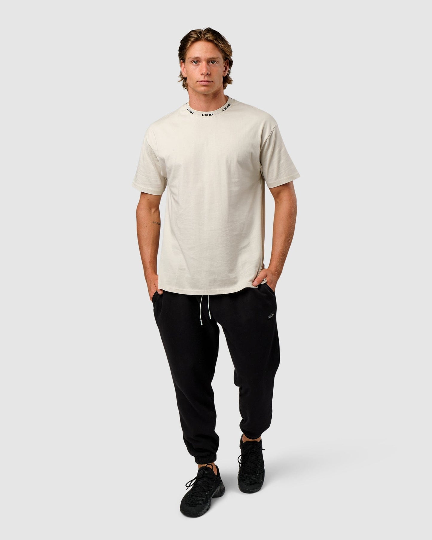 Model wearing Laps Tee Oversize - Bone