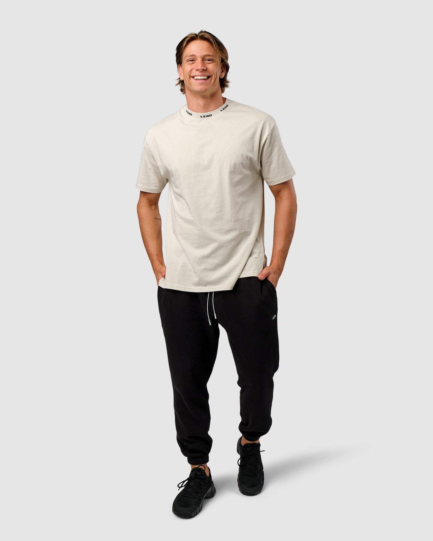 Model wearing Laps Tee Oversize - Bone