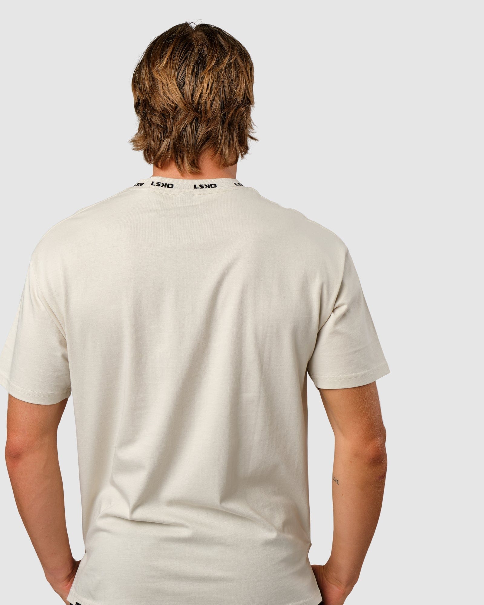 Model wearing Laps Tee Oversize - Bone