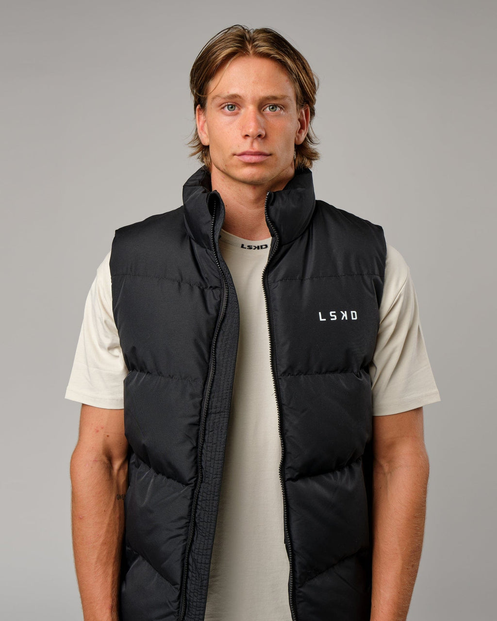 Model wearing Essential Puffer Vest - Black