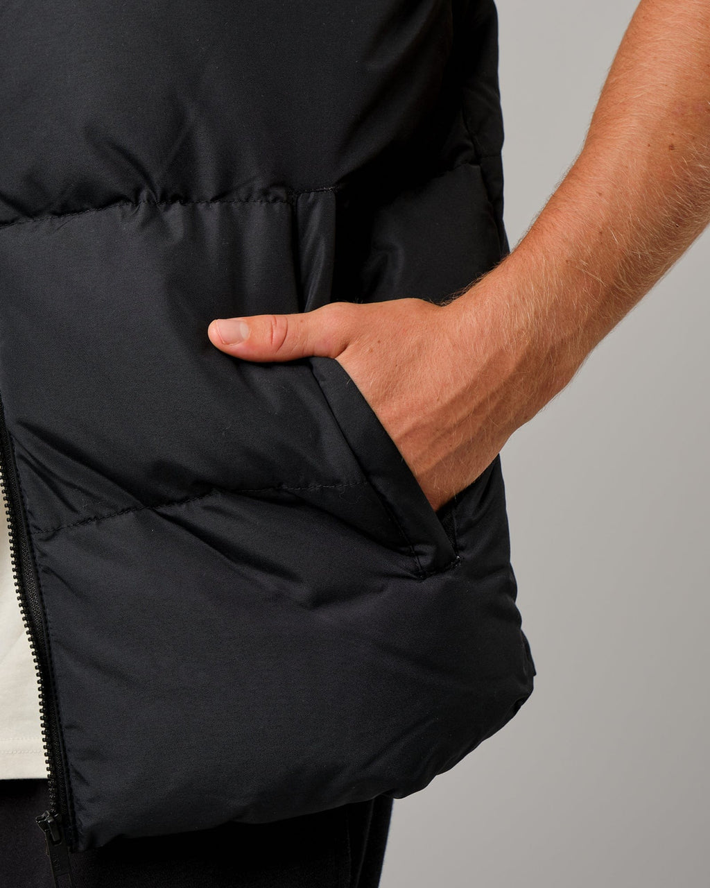 Model wearing Essential Puffer Vest - Black