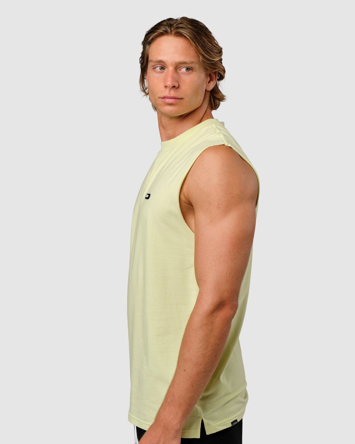 Model wearing Capsule Tank Oversize - Pastel Lime