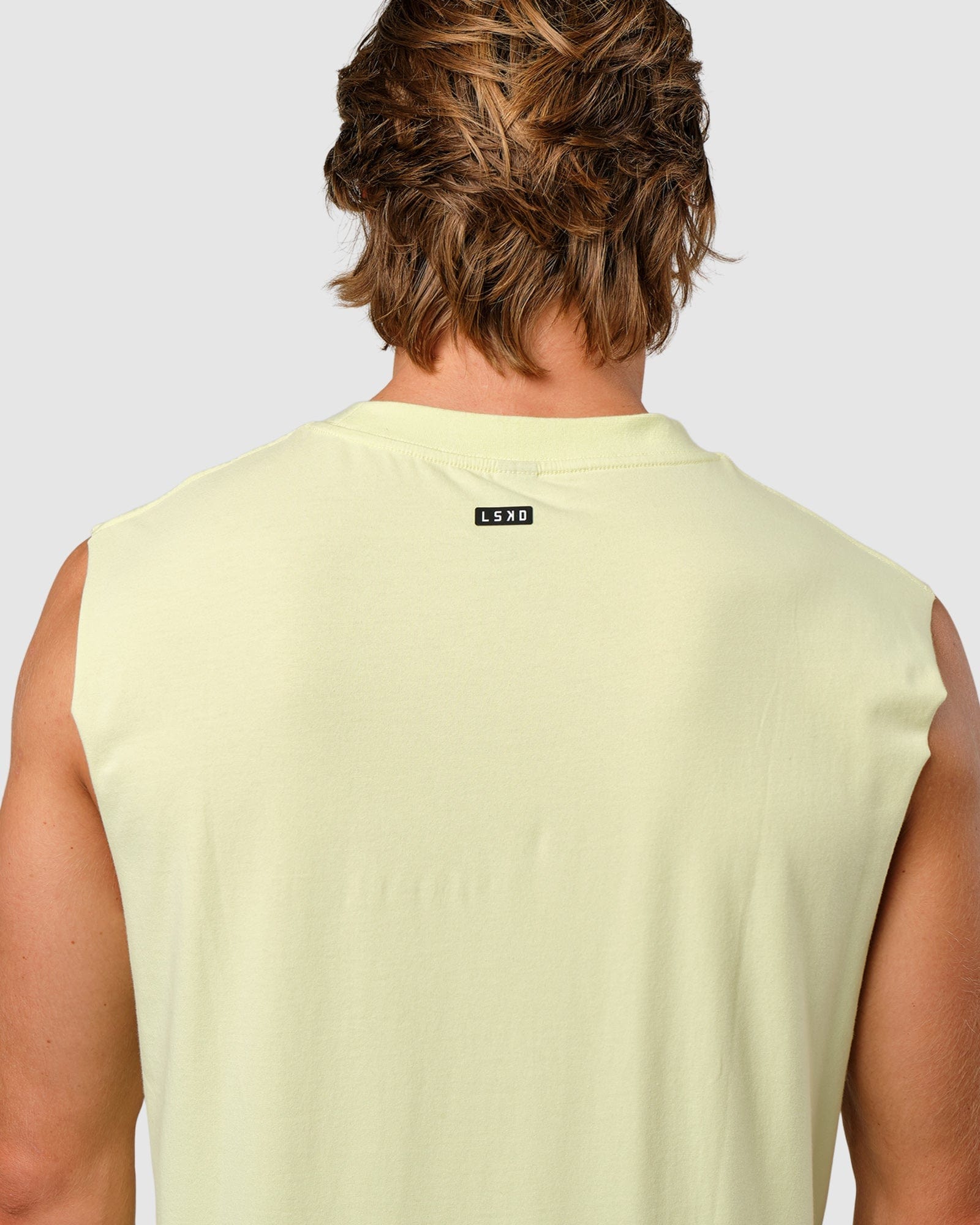 Model wearing Capsule Tank Oversize - Pastel Lime