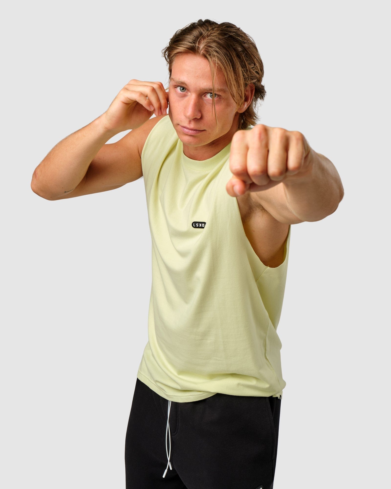 Model wearing Capsule Tank Oversize - Pastel Lime