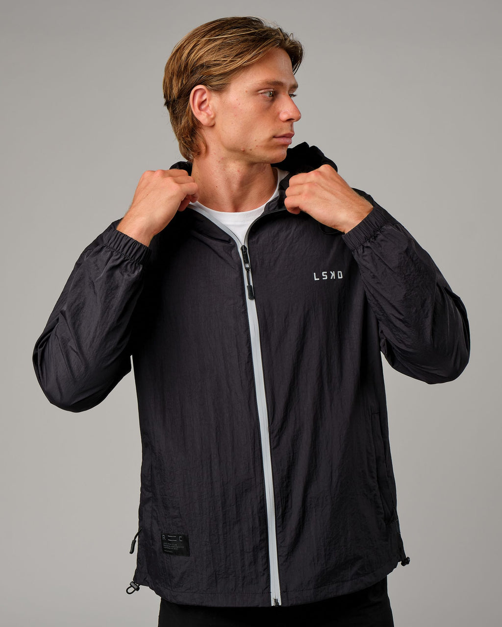 Model wearing Run Club Track Jacket - Black-Reflective