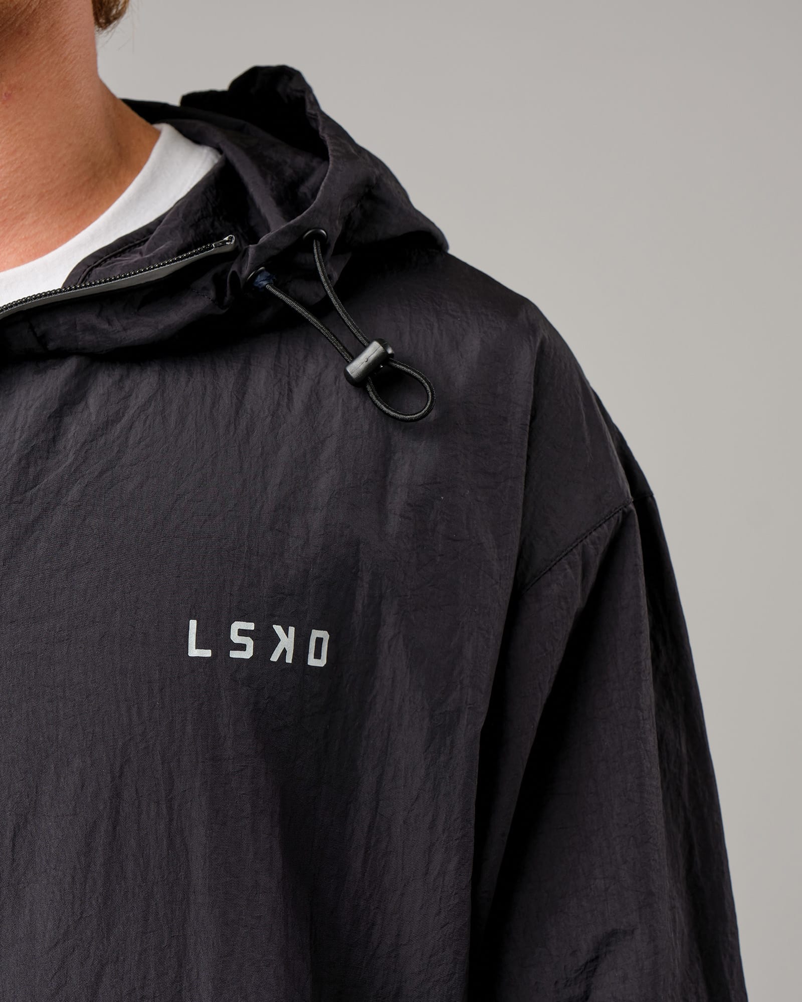 Model wearing Run Club Track Jacket - Black-Reflective