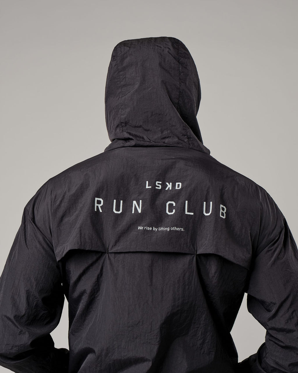 Model wearing Run Club Track Jacket - Black-Reflective