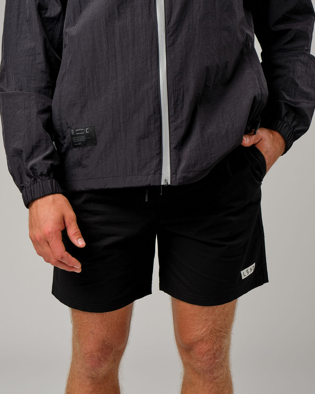 Model wearing Run Club Track Jacket - Black-Reflective