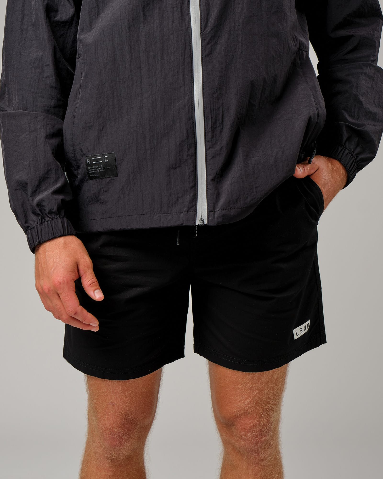 Model wearing Run Club Track Jacket - Black-Reflective